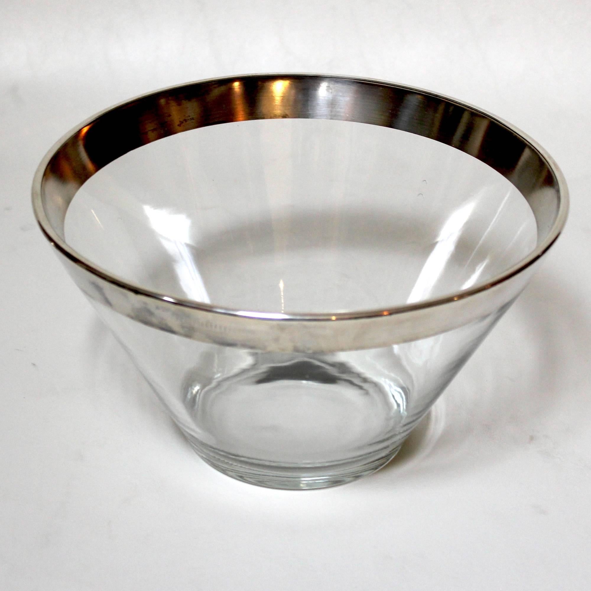 Set of six Mid-Century Modern crystal and sterling silver bowls by Dorothy Thorpe. The set consists of one large serving bowl and five smaller individual bowls. The large bowl measures 10.5