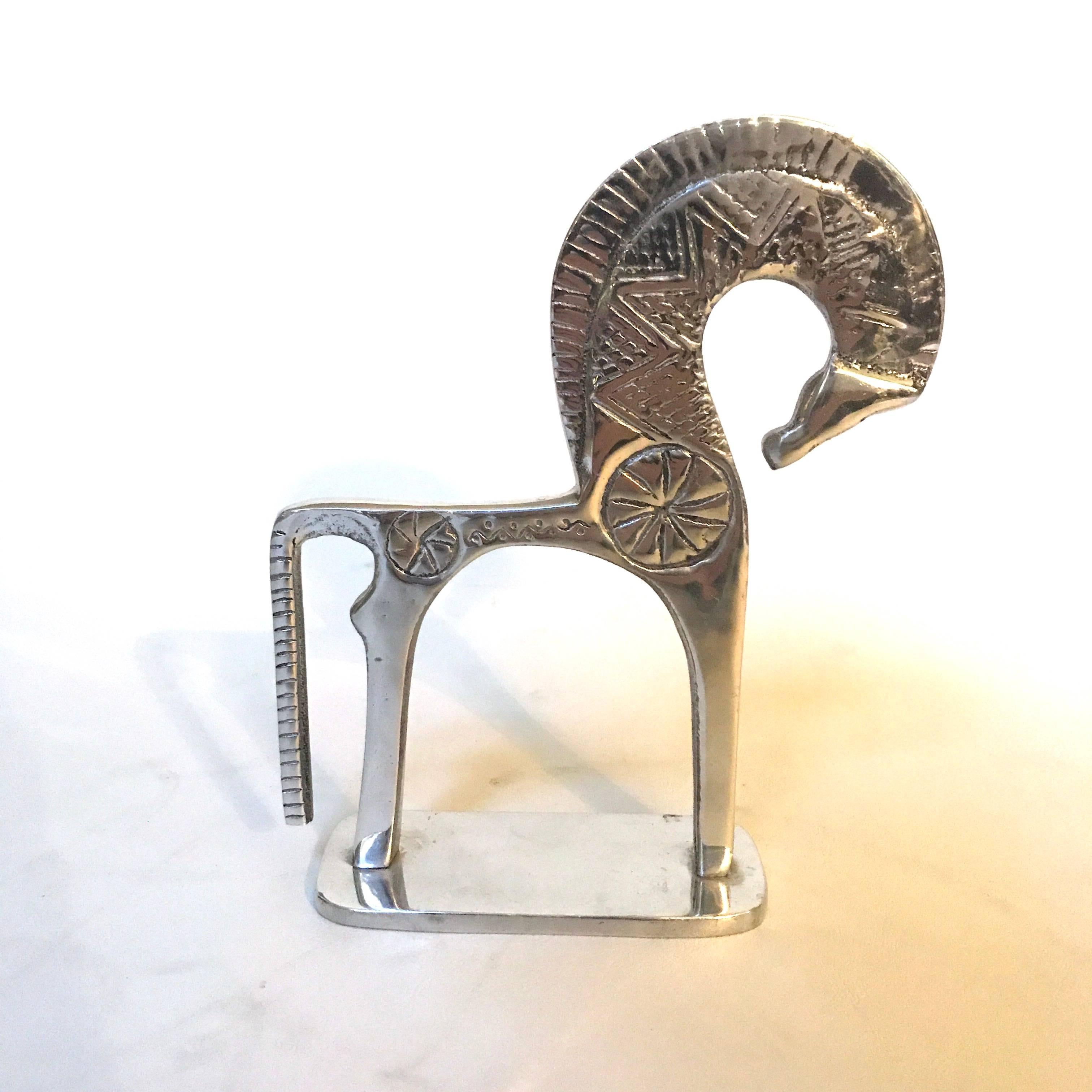 Vintage Mexican aluminium horse in the style of Frederick Weinberg. The horse is designed after Weinberg's midcentury interpretation of Etruscan designs. In excellent condition.