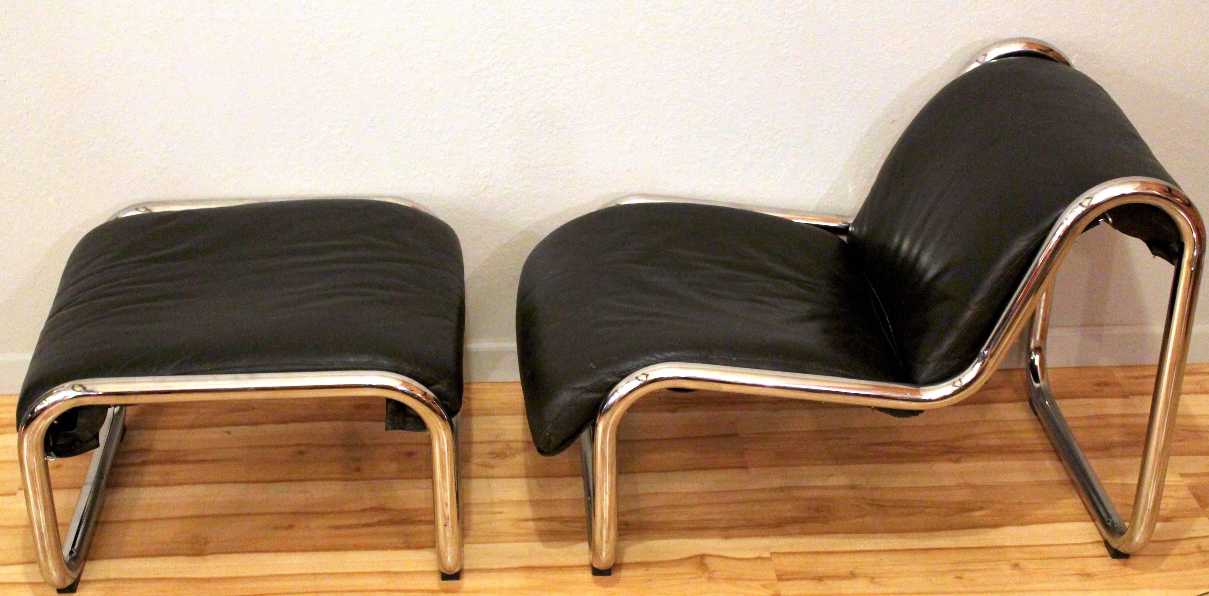 1970s mod black leather and chrome lounge chair and ottoman by Kinetics Furniture of Canada. No marks or tears.

Chair measures 24