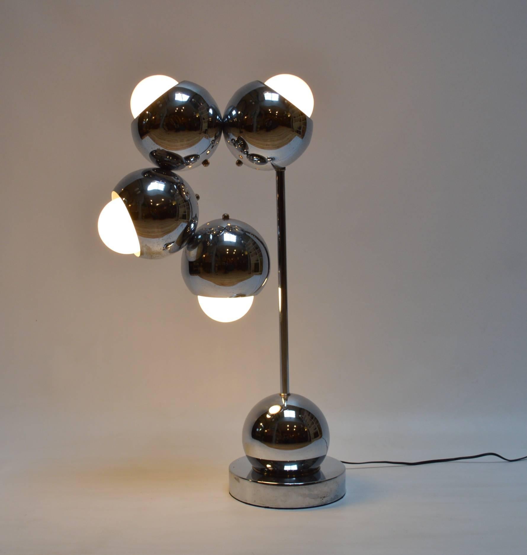 Very unique mid-century modern 4-light chrome eyeball table lamp. 