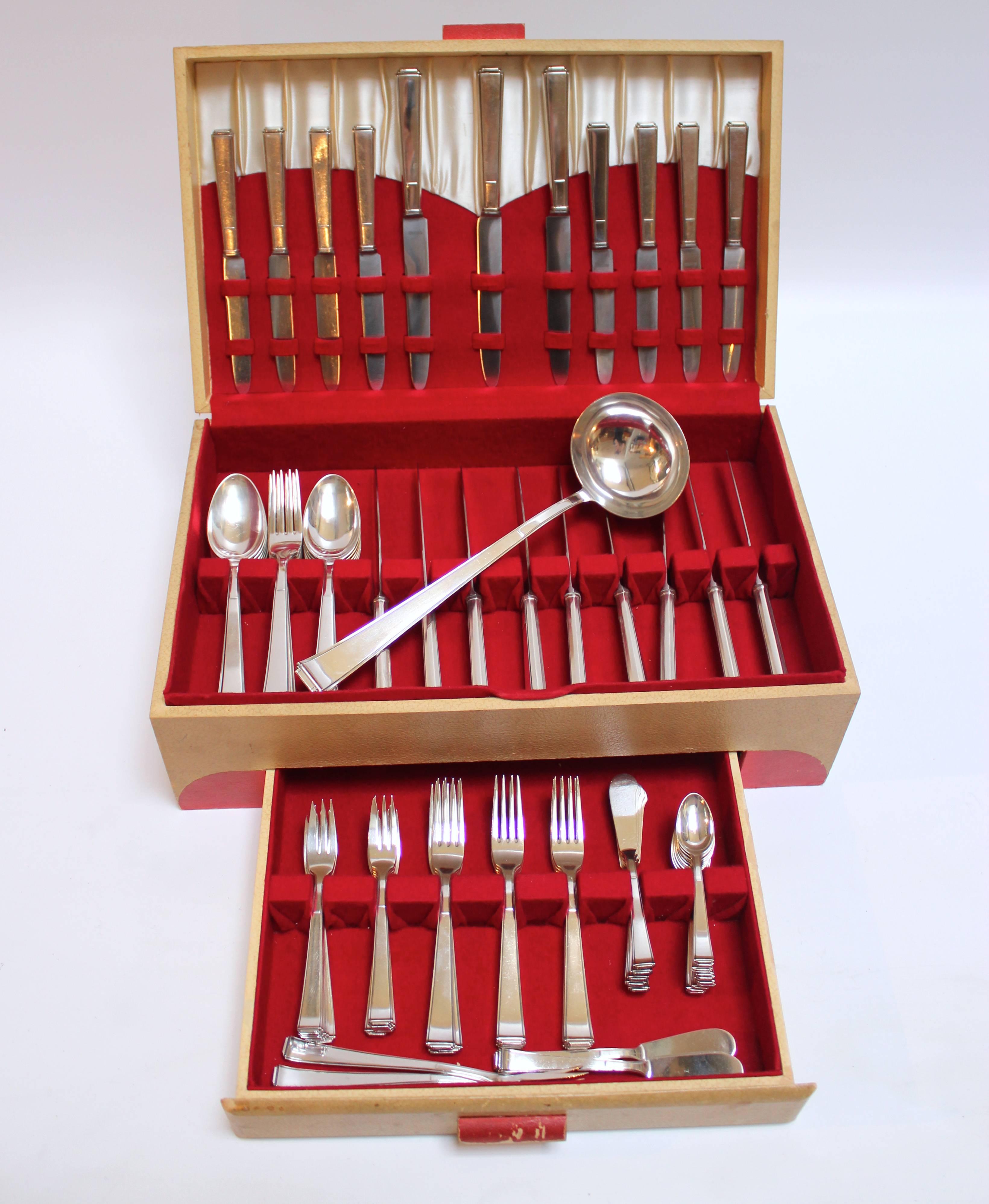 Canteen of Art Deco "Skyscraper Moderne" silver-plate flatware comprising 87 pieces. German, circa 1935, manufactured by Bremer Silversmiths.

Complete service for eight, partial service for 12, as follows:

 12 dinner knives
 12 soup