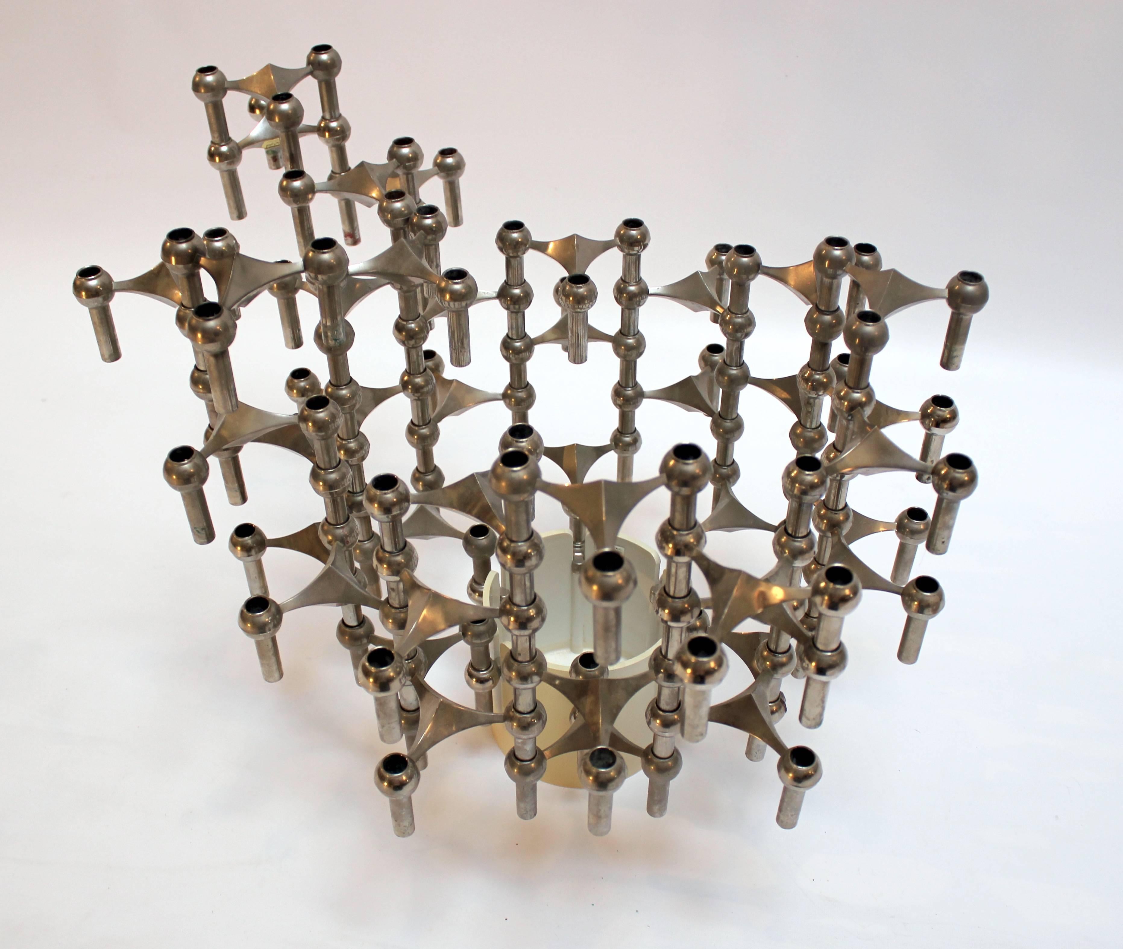 1960s 40-piece stackable candlestick sculpture designed by Fritz Nagel and Caeser Stoffi and manufactured by BMF. Set is modular and includes base. Base is marked 