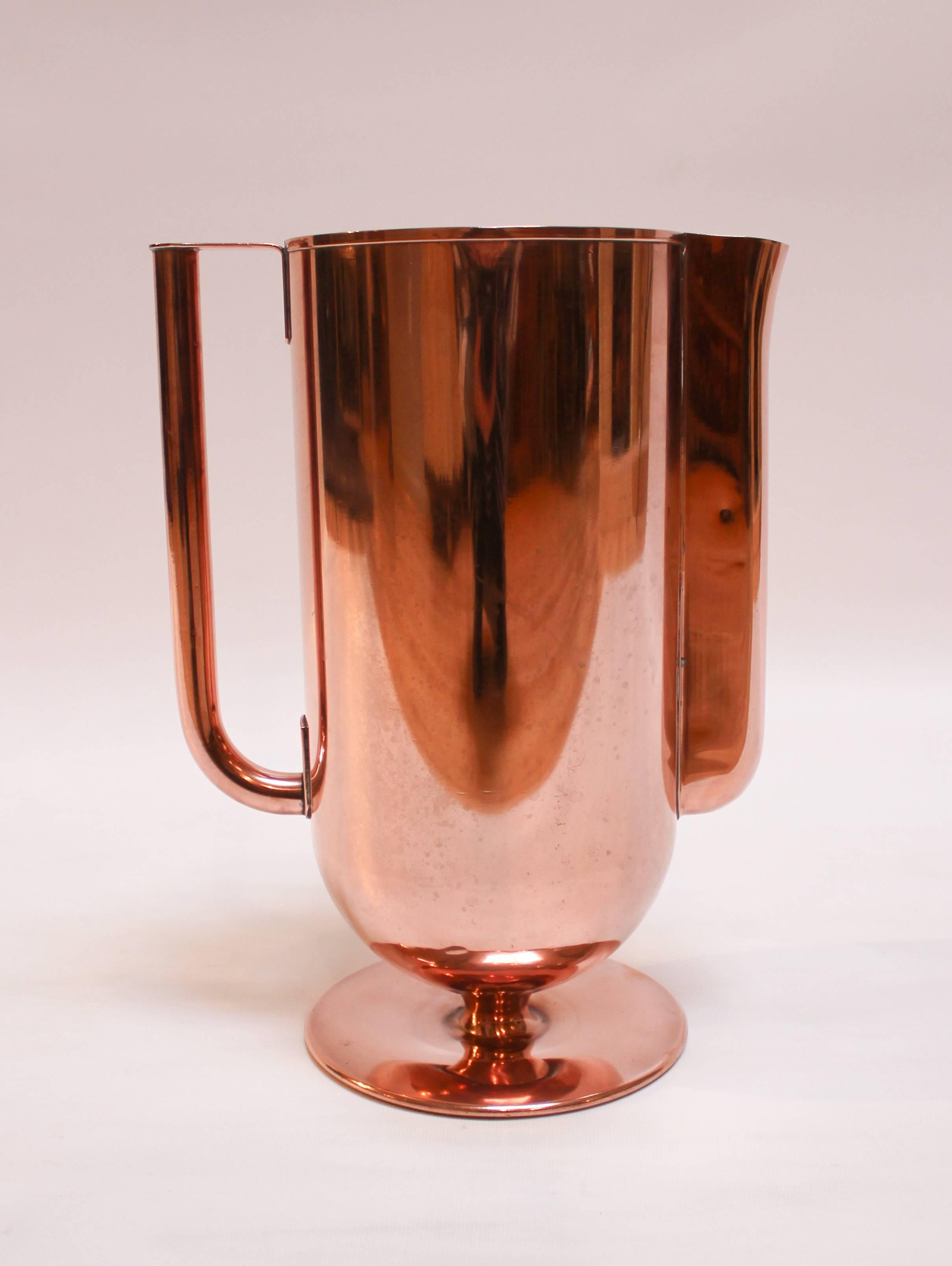 1930s Art Deco Streamline copper water pitcher with silvered tin lining.