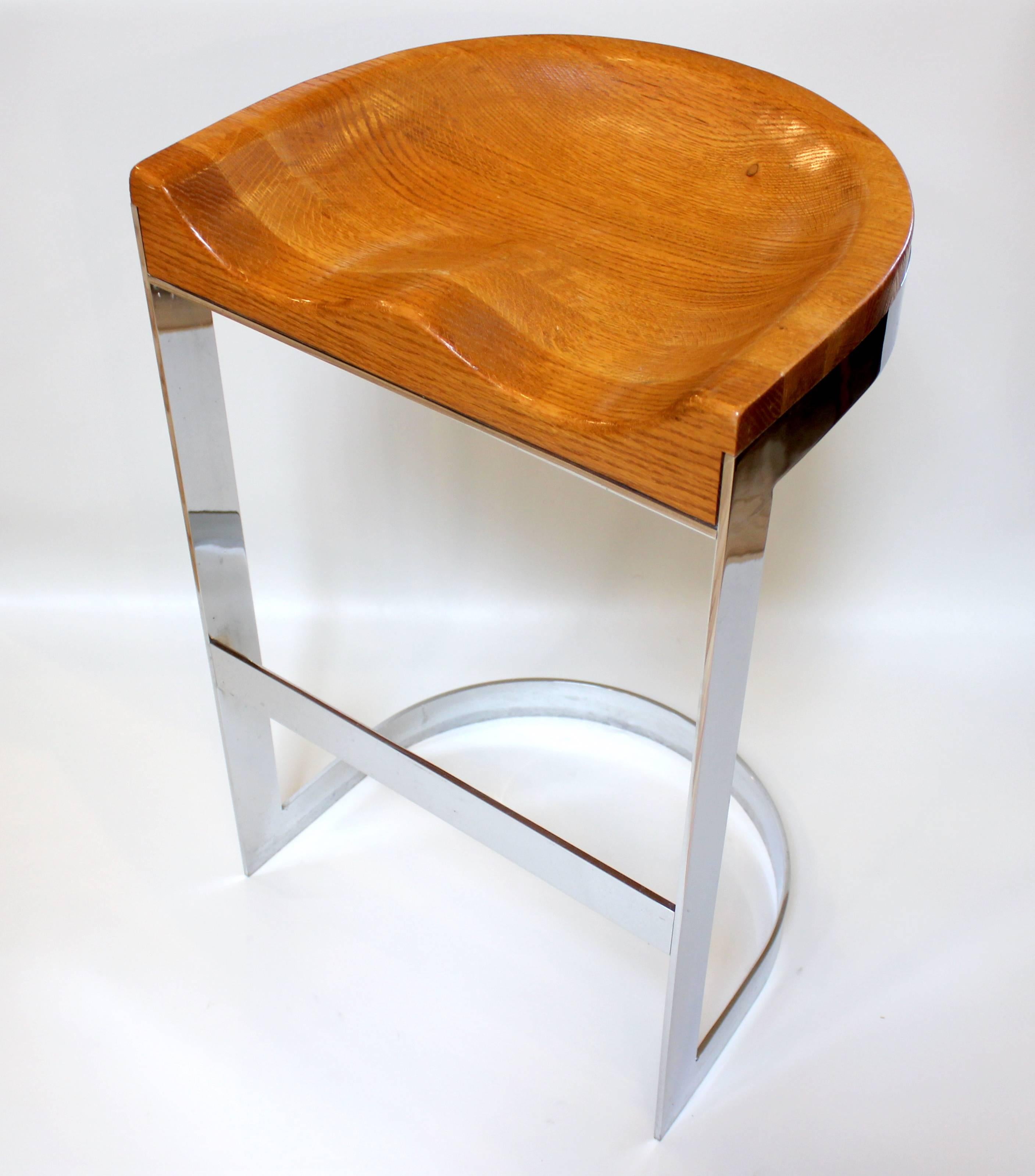 Chrome bar stool with sculpted oak seat designed by William Bacon, circa 1970.