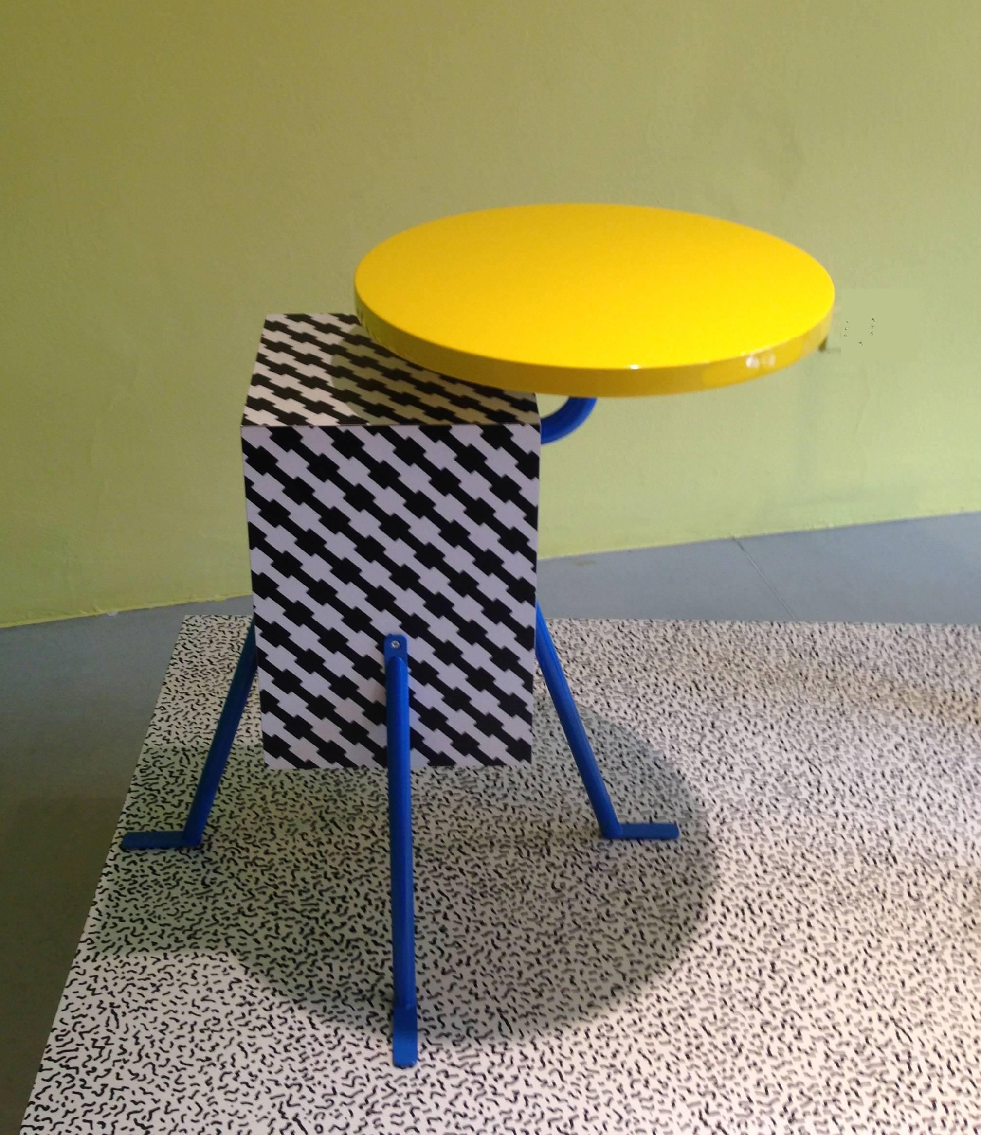 From the inaugural 1981 Memphis collection, this very popular design by Michele De Lucchi (one of the founding members of the design collective) implements a De Lucchi laminate design named 