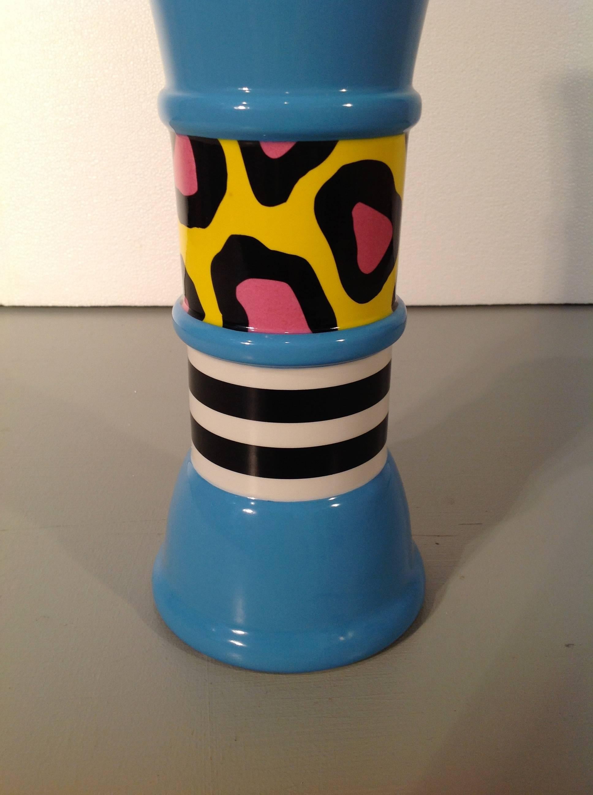 CARROT Ceramic Flower Vase by Nathalie Du Pasquier for MEMPHIS srl (1985)

An unequivocal example of the power of Nathalie's understand of pattern & visual imagery.  As the principal pattern designer for MEMPHIS products in the early 1980's, she