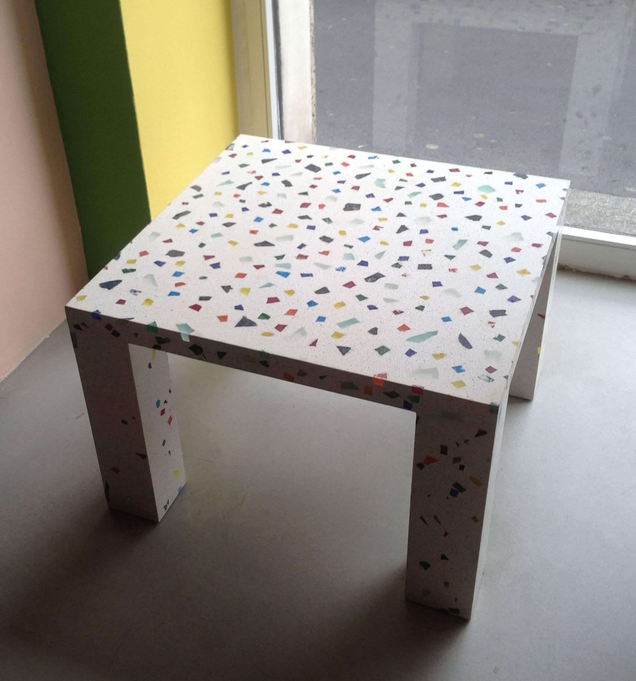 Nara aquare table (1983).
Shiro Kuramata (Japan) / Memphis Milano.
Square end or coffee table in metal and colored-glass-infused "Star Piece" terrazzo. 
Dimensions: W 23.75" x D 23.75" x H 16".

An important table design