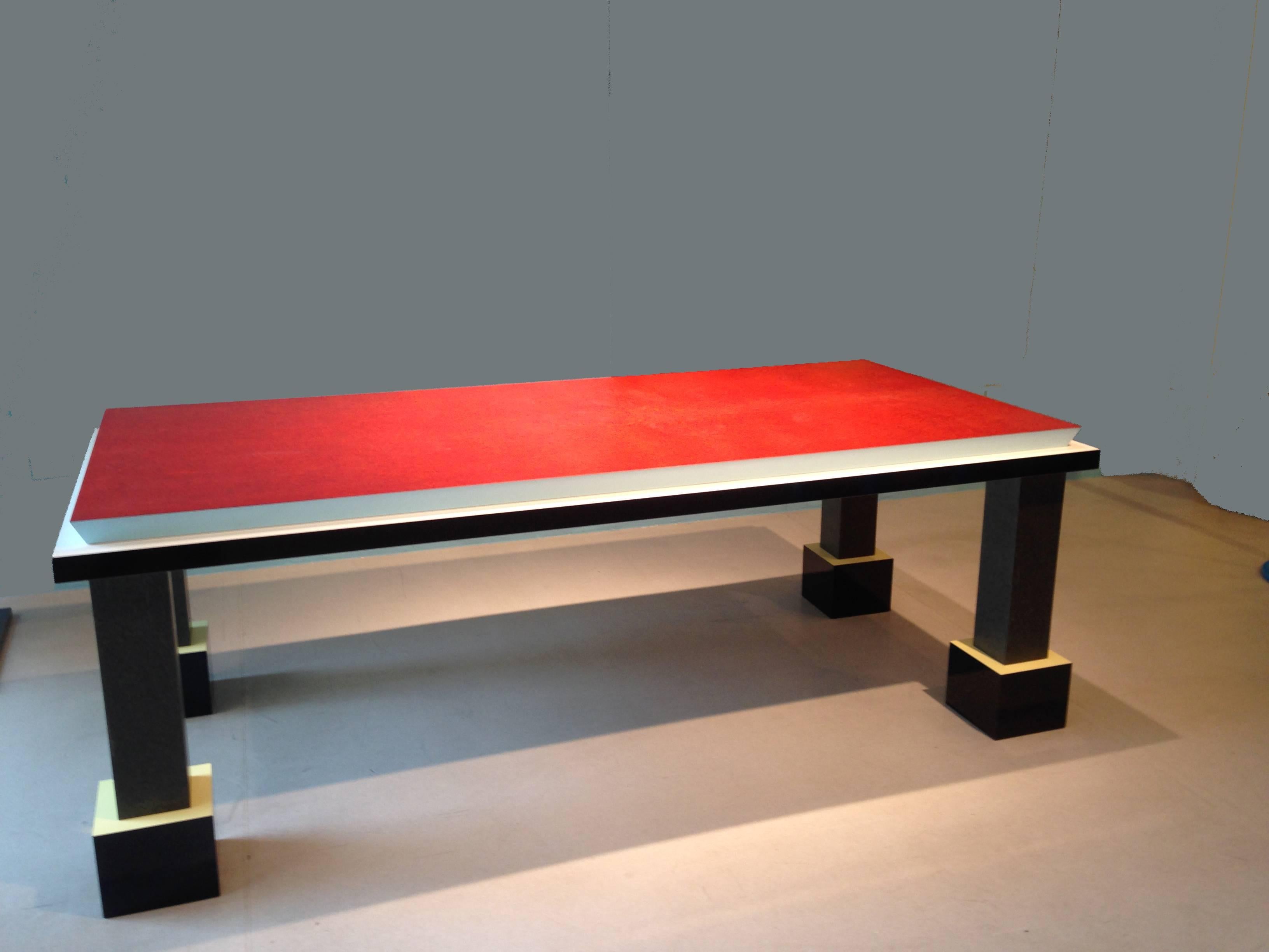A Sottsass tour-de-force multi-use table from the Memphis 1984 collection. Masterly usage of reddish briar on the table top, grayish-black briar on the legs and a curious implementation of plastic laminates on the remainder.

High meets low ---
