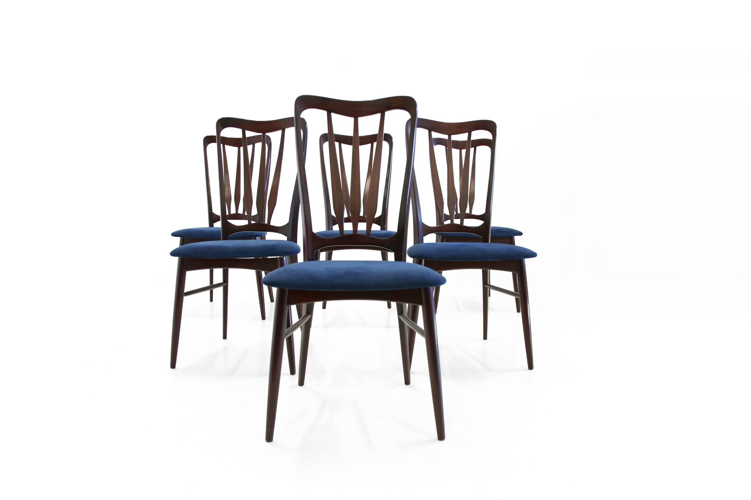 Set of six dining chairs on a mahogany frame. 

This is model 'Ingrid'. Designed by Niels Kofoed and made in Denmark by Hornslet Møbelfabrik from circa 1960, first half.

The chairs are in excellent vintage condition with a sturdy framework.