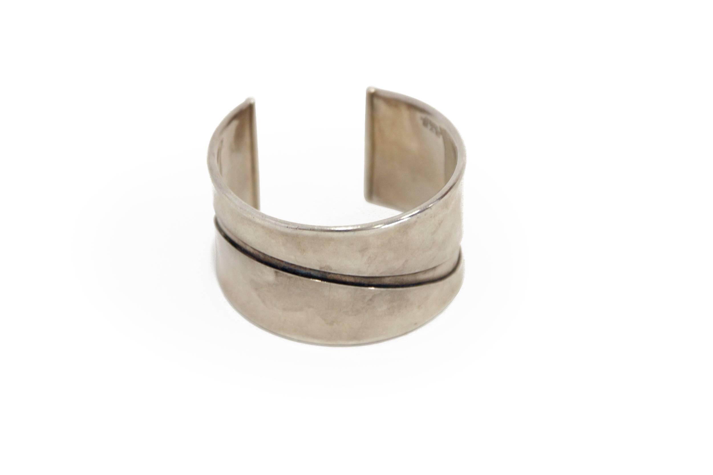 Rare silver bracelet by one of Norway's most renowned jewelry designers.

Made by Tone Vigeland at the Plus studio workshop, Fredrikstad, circa 1960s second half.

Vigeland is today featured in the collections of numerous Norwegian and