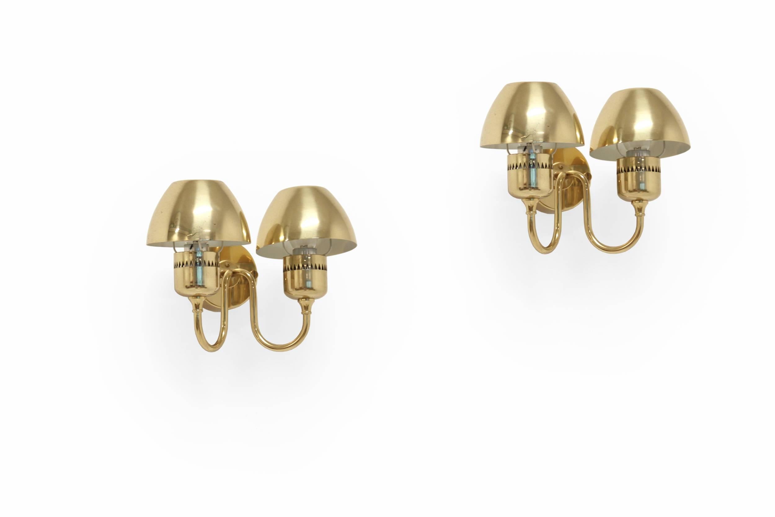 Rare pair of wall lights on brass frame and shades. 

Designed and made in Sweden by Hans-Agne Jakobsson from, circa 1960s second half.

Both wall lights are fully working and in good vintage condition.

 