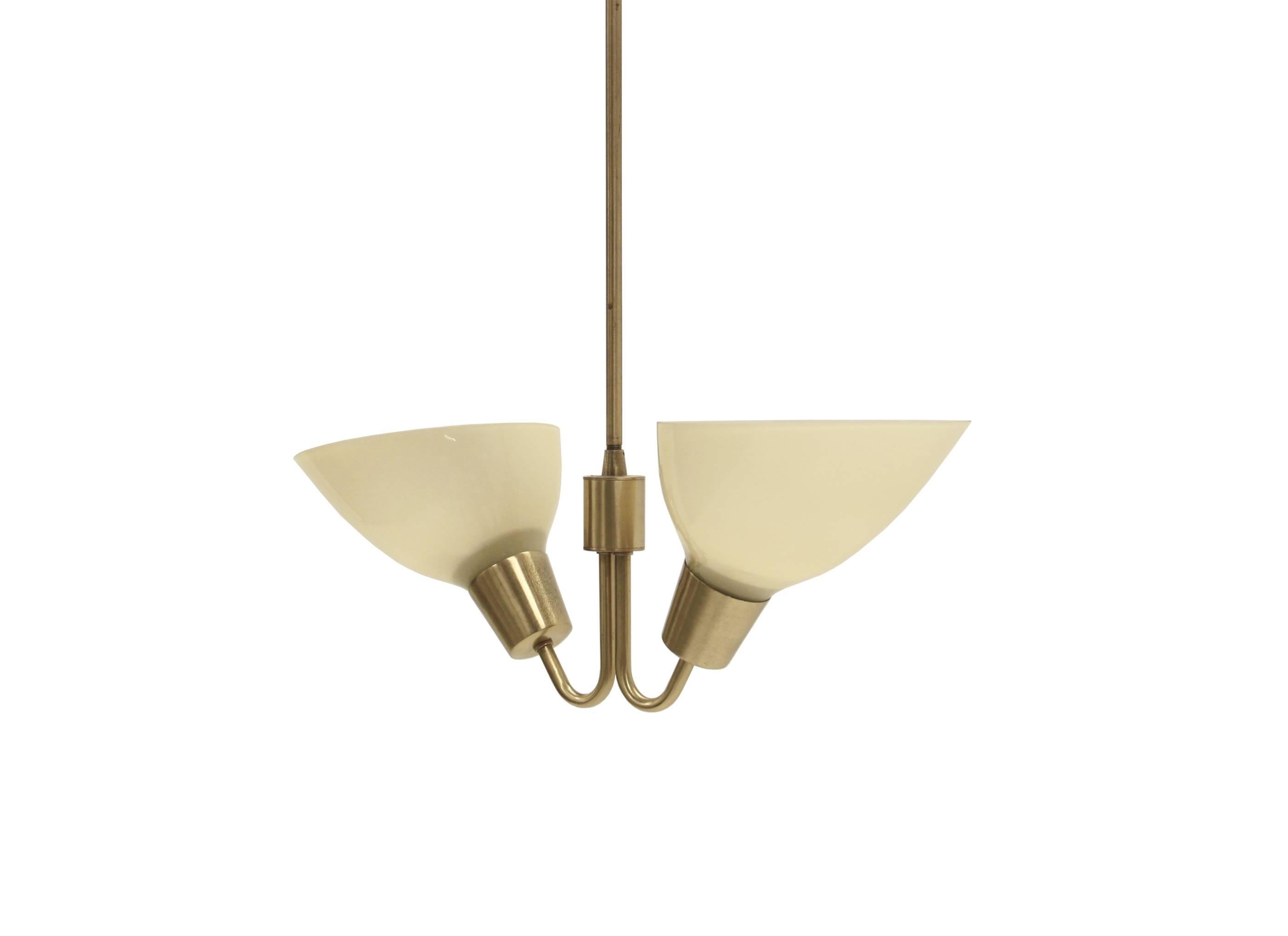 Two armed chandelier in brass with shades in opaline glass. Designed and made in Norway from circa 1960s second half. The lamp is fully working and in very good vintage condition, each bulb holds one E27 bulb (works in the US) with a max wattage of