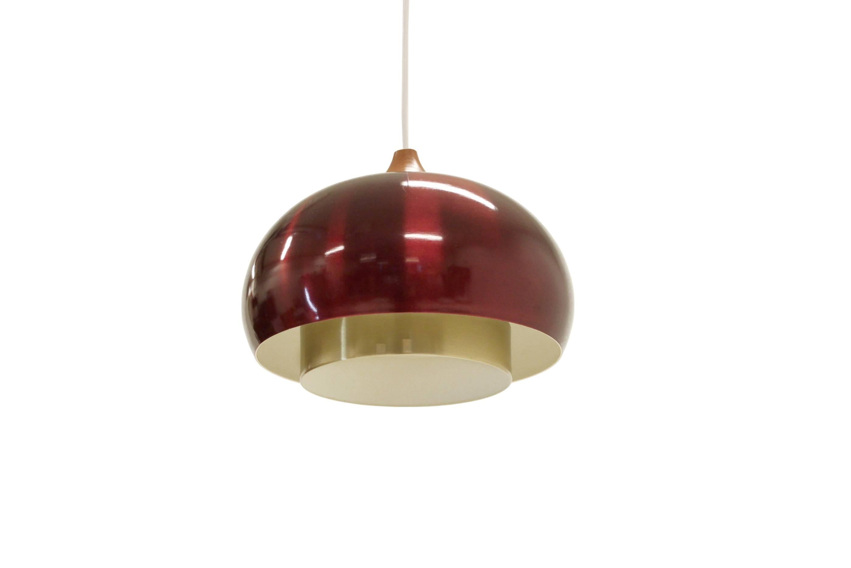 Beautiful and rare ceiling lamp on a anodized aluminum and brass frame.

Designed and made in Norway by T. Røste & Co from circa 1970s first half.

The lamp is fully working and in excellent vintage condition.

 