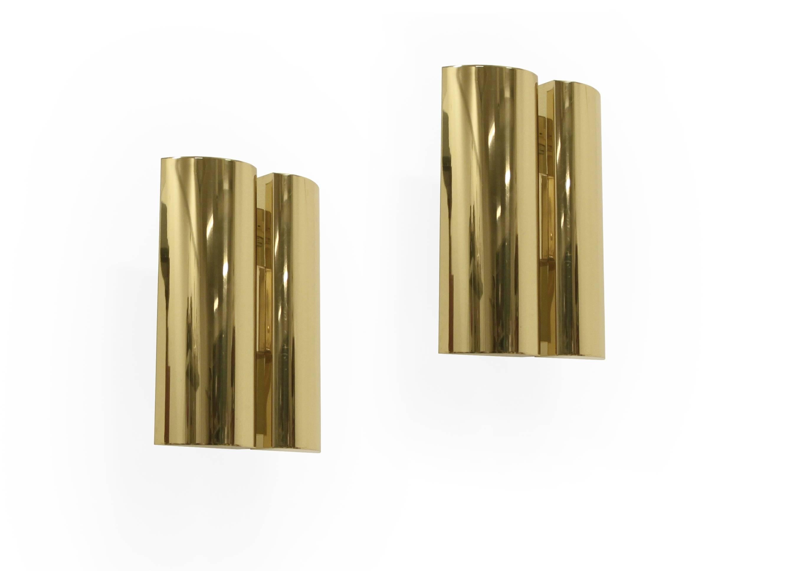 Beautiful and sublime pair of wall lights in brass.

Designed and made in Sweden by Falkenbergs from circa 1980 first half.

Both lamps fully working and in good vintage condition.