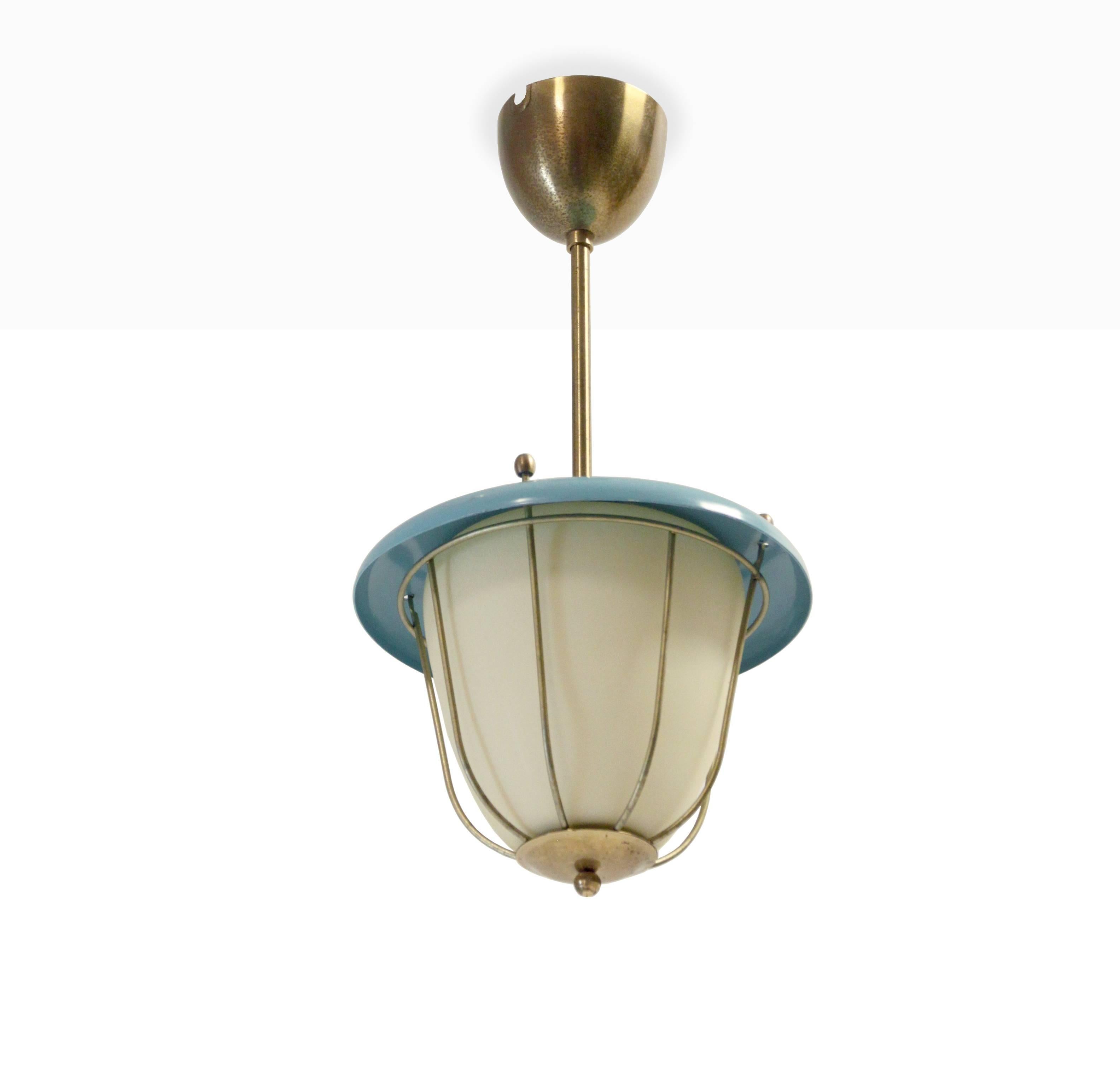 Wonderful ceiling light in a brass frame, steel and shade in opaline glass.

Most likely designed and made in Norway from circa 1950s second half.

The lamp is fully working and in excellent vintage condition.