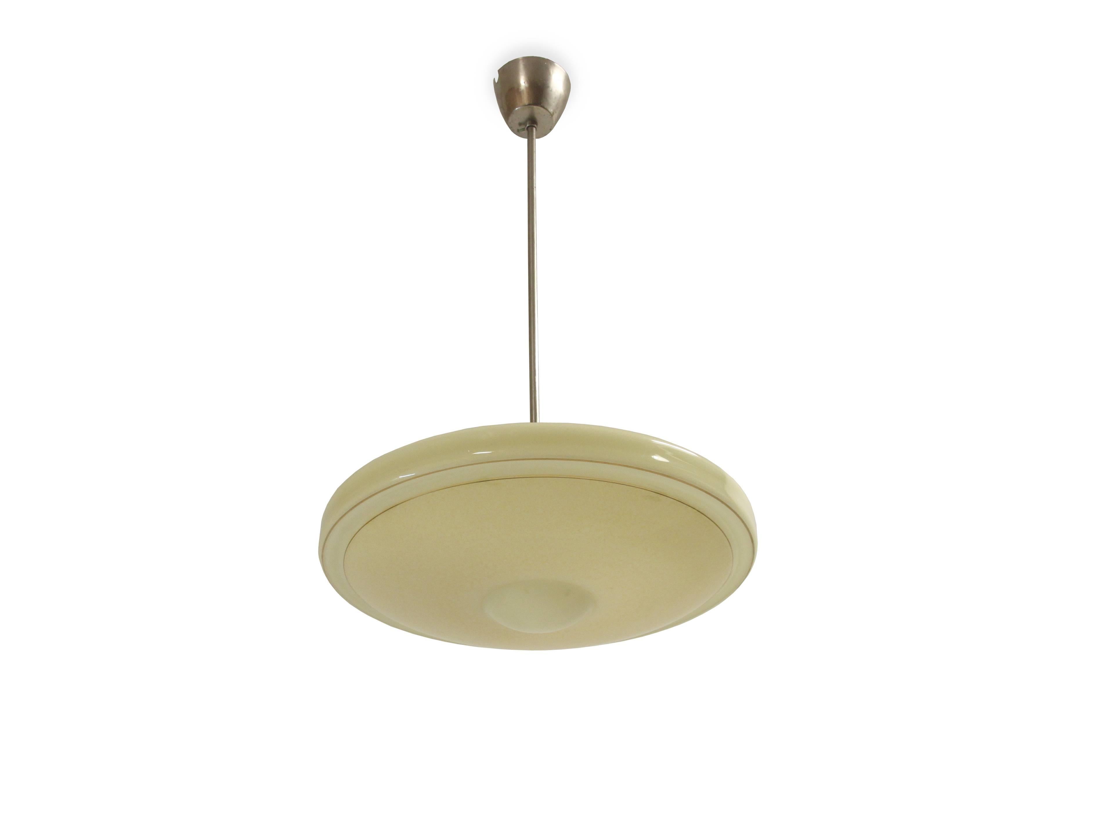 Wonderful and decorative ceiling light in opaline glass and stem in chrome. Designed and made in Norway by Høvik Verk from circa 1950s first half.
The lamp is fully working and in good vintage condition.
