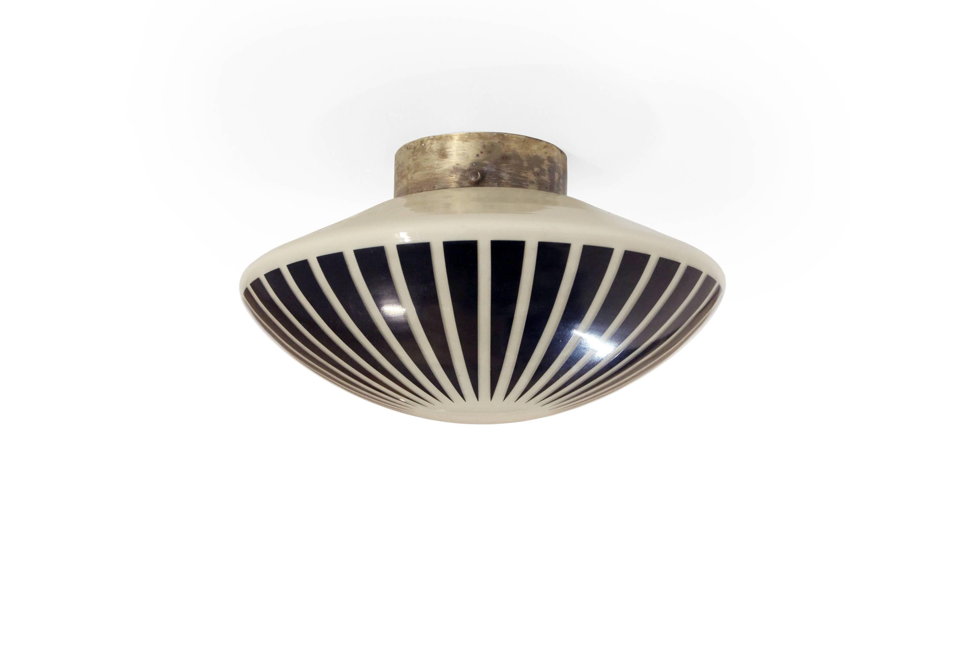 Wonderful and rare ceiling lamp with a base frame and opaline shade with surface decoration. Designed by Birger Dahl and made in Norway by Sønnico from circa 1960s second half. The lamp is fully working and in excellent vintage condition.

 