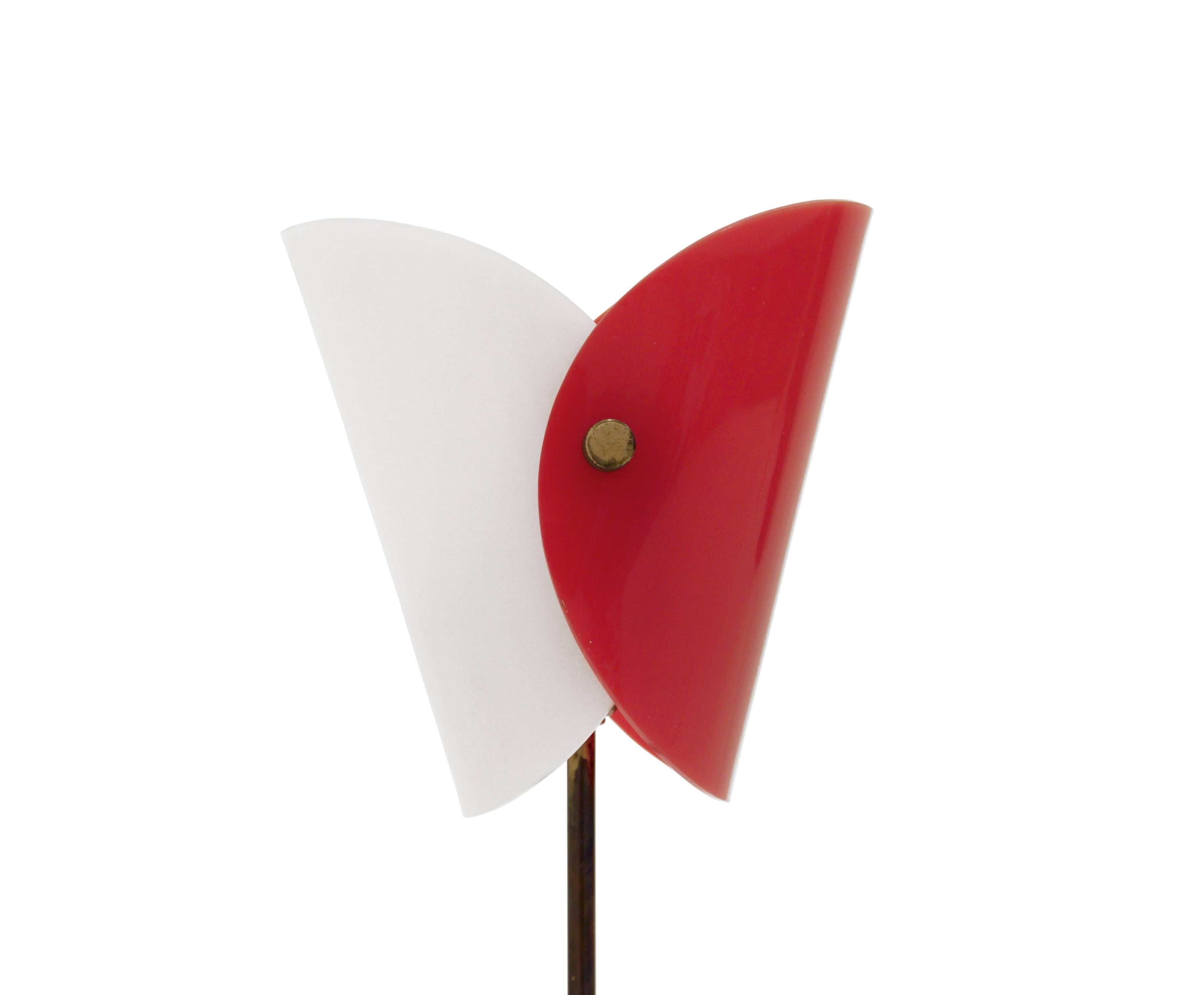 Wonderful table lamp with a brass base and shades in plexiglas was designed and made in Sweden in the late 1960s by KLK lightening. The lamp is fully working and in good vintage condition.