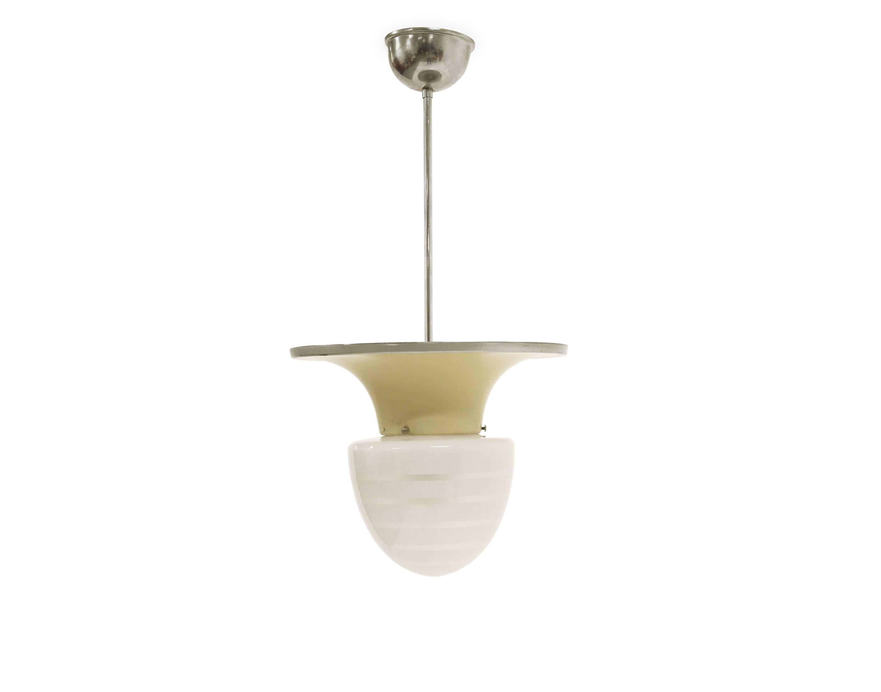 Sculptural ceiling lamp in steel with shade in opaline glass. Designed and made in Sweden by Bohlmarks, circa second half of 1930. The lamp is fully working and in good vintage condition with normal age related wear.
