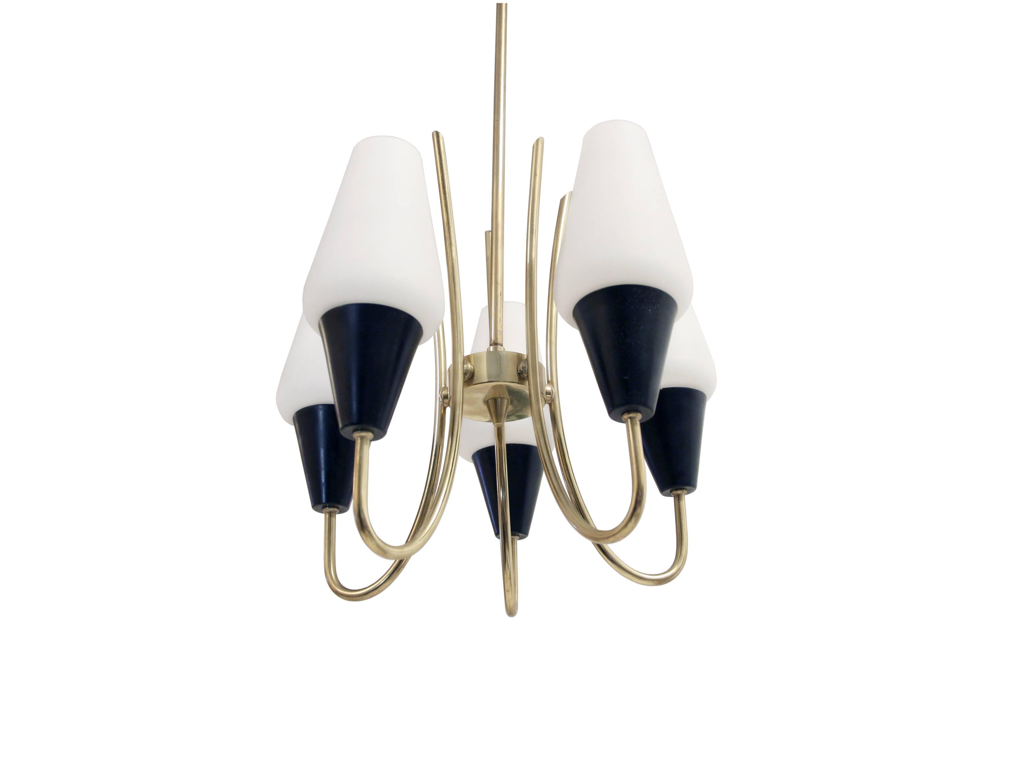 Wonderful and decorative five-armed chandelier in brass, steel and opaline glass. Designed by Jonas Hidle and made in Norway by Høvik Verk from circa 1960s first half. The lamp is fully working and excellent vintage condition.
