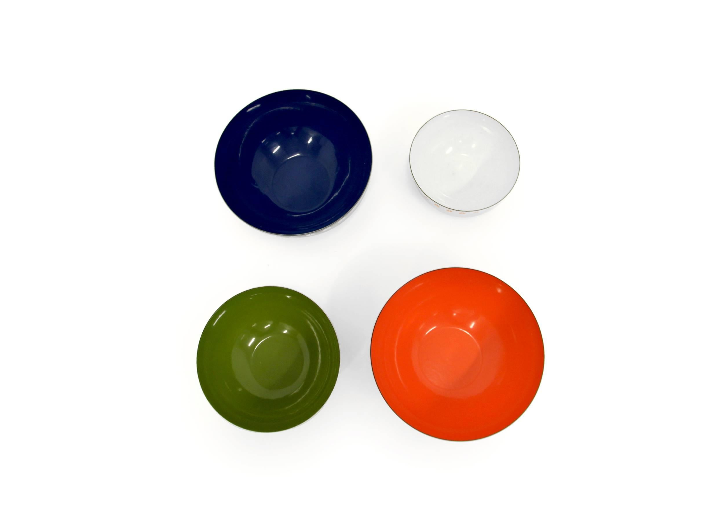 A set of beautiful enamel and steel bowls designed by Grete Prytz Kittelsen and Arne Clausen.

Manufactured in Norway from, circa 1960 first half by Cathrineholm.

The blue and orange bowl are the large version with a diameter of 28.5 cm.