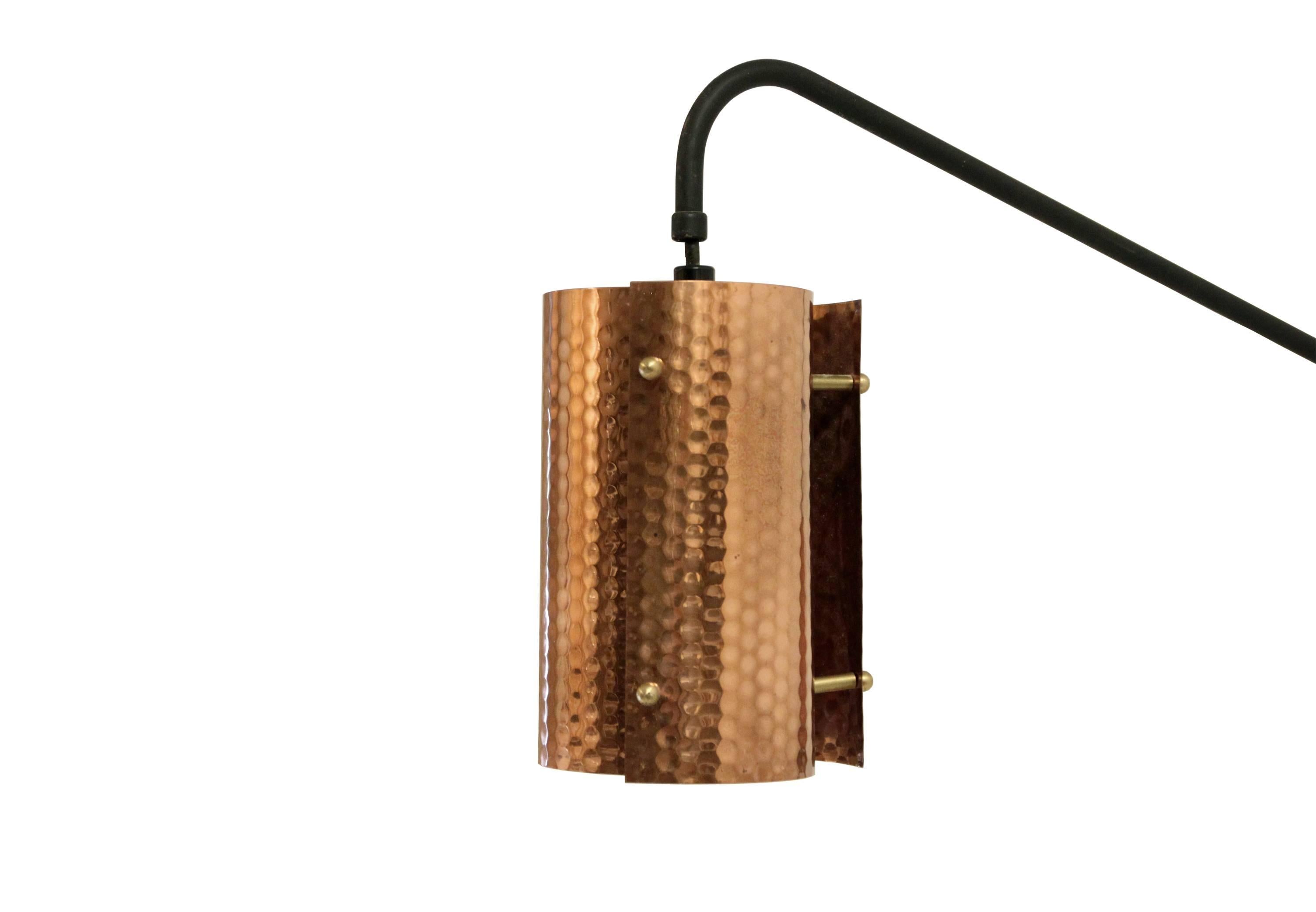 Decorative wall light in copper and lacquered steel.

Designed and made in Norway in the second half of the 1960s.

The lamp is fully working and in good vintage condition.