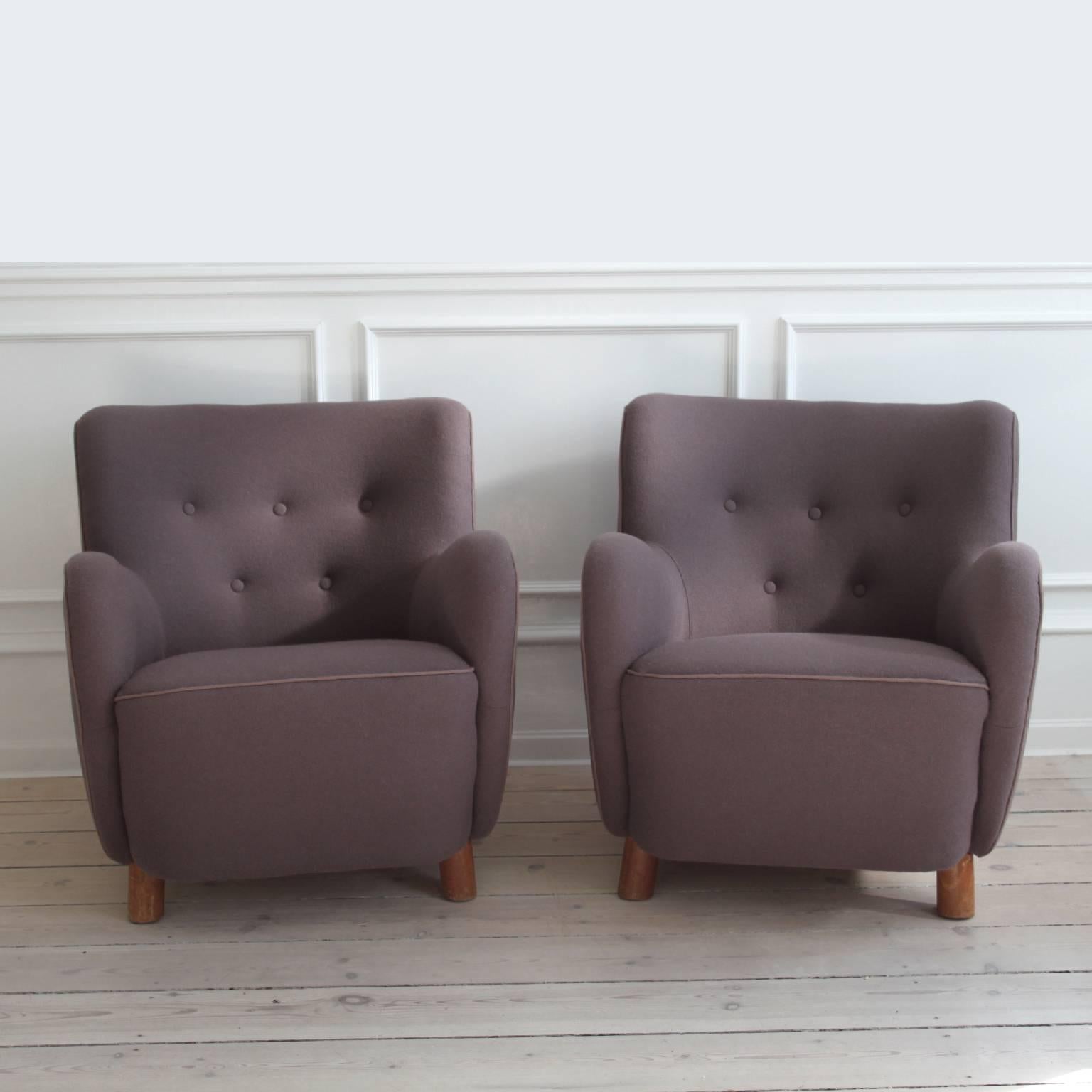 MOGENS LASSEN - MID-CENTURY MODERN DESIGN / SCANDINAVIAN MODERN

A pair of easy chairs by the iconic Danish architect and designer Mogens Lassen, Denmark, 1940s 

Upholstered in dusty purple colored fabric by Kvadrat, the leading fabric manufacturer