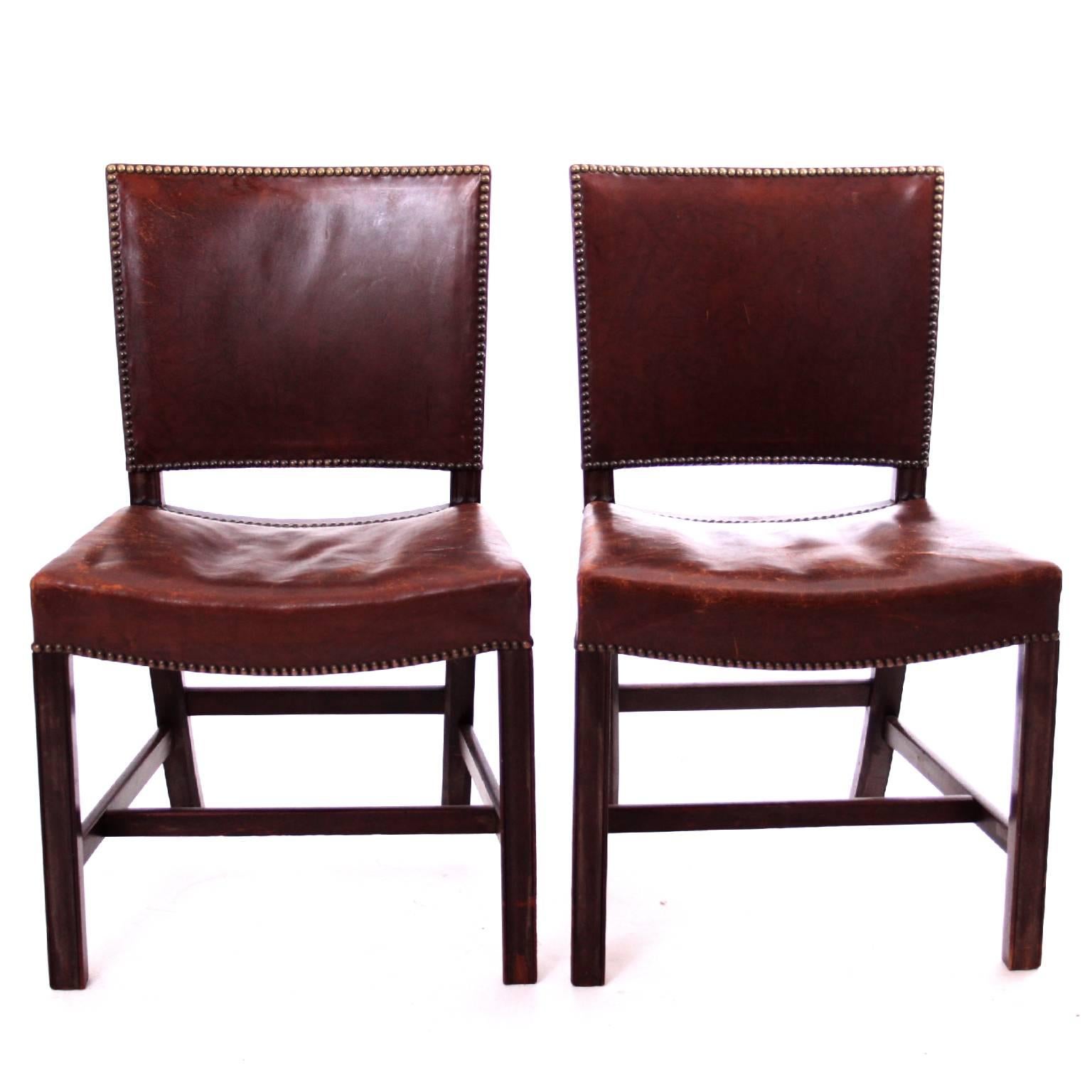 KAARE KLINT & CABINETMAKER RUD RASMUSSEN - SCANDINAVIAN MODERN

A set of two iconic Kaare Klint 'Red Chairs', executed by cabinetmaker Rud. Rasmussen, Denmark, 1930s. 

Profiled legs and seat and back upholstered with patinated brown leather and