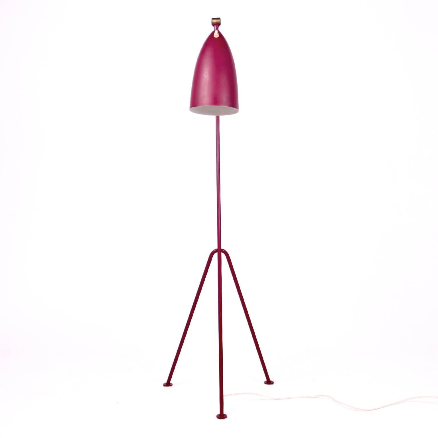 Early Greta Magnusson Grossman grasshopper lamp 

The grasshopper lamp has a tripod Stand and an adjustable elongated conical shade. 

Original red enameled steel and aluminum, brass fitting. 

Designed in 1947. 

Produced by Bergboms