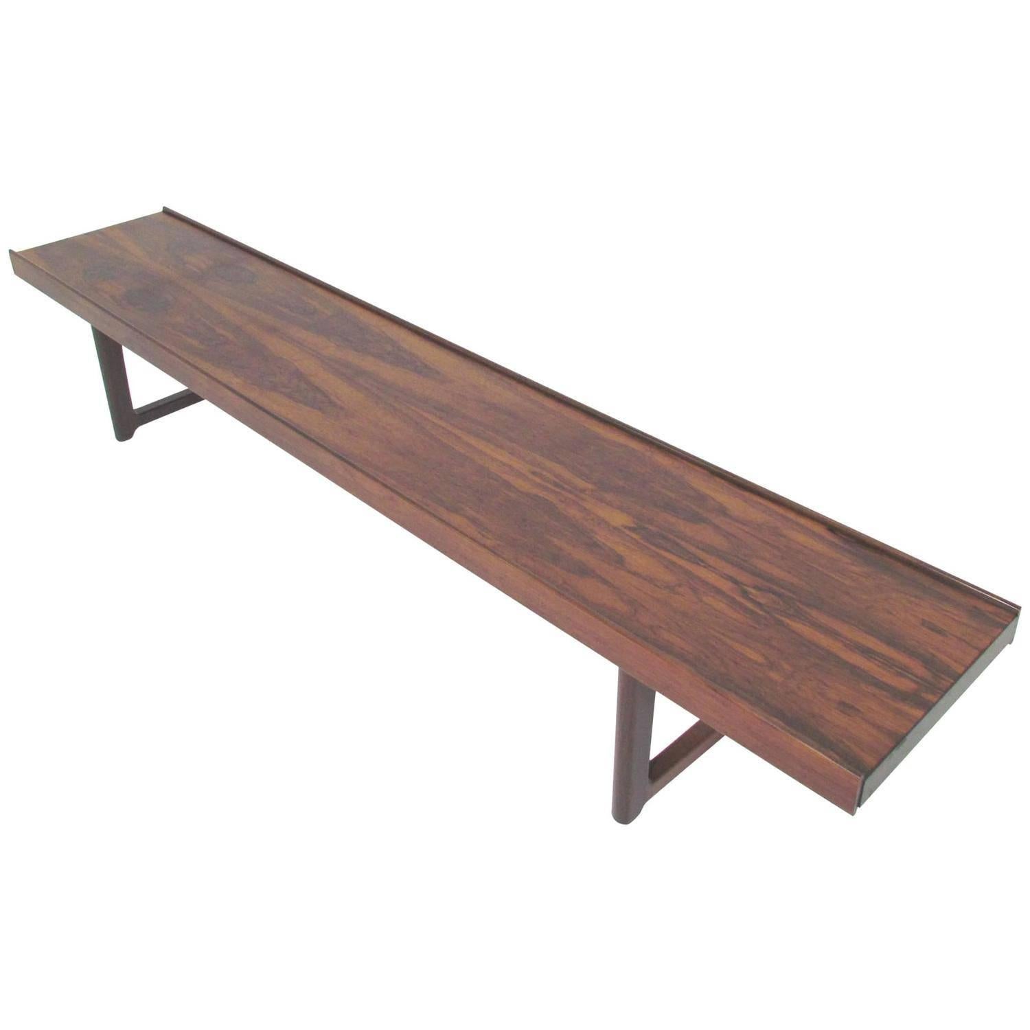 Pair of long benches or side tables model Krobo in rosewood designed by Torbjørn Afdal. This is the long version (200cm).

Manufactured in Norway by Bruksbo, circa 1960.

Very good vintage condition,

Also sold individually.