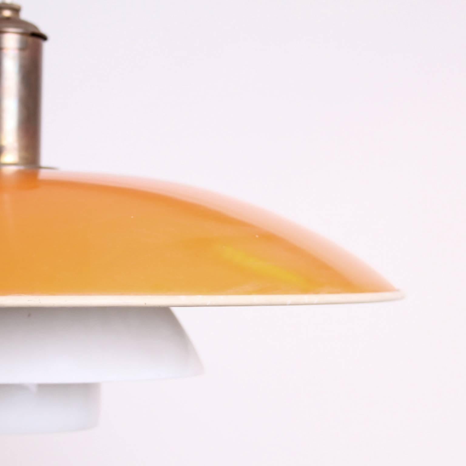 POUL HENNINGSEN AND LOUIS POULSEN

SCANDINAVIAN MODERN

This original ceiling lamp PH 5/4 was designed by Poul Henningsen and manufactured by Louis Poulsen, Denmark, 1940s. 

The materials are yellow enameled metal top shade, center and bottom shade