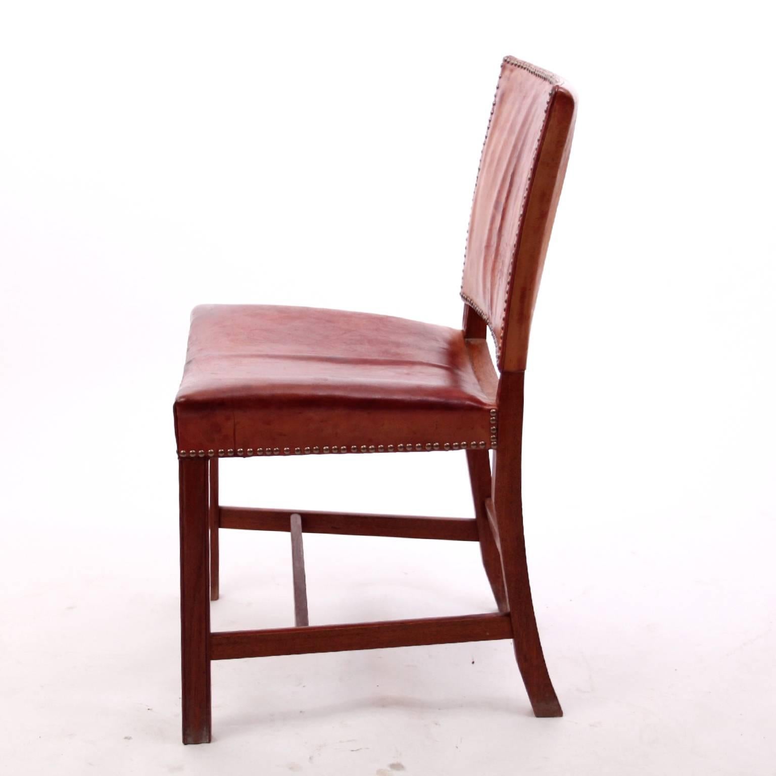 KAARE KLINT & RUD RASMUSSEN - MID-CENTURY MODERN DESIGN / SCANDINAVIAN MODERN

A set of three of the icomic Kaare Klint 'Red Chairs' or 'Barcelona Chairs'

Profiled legs of Cuban mahogany, seat and back upholstered with original red leather and