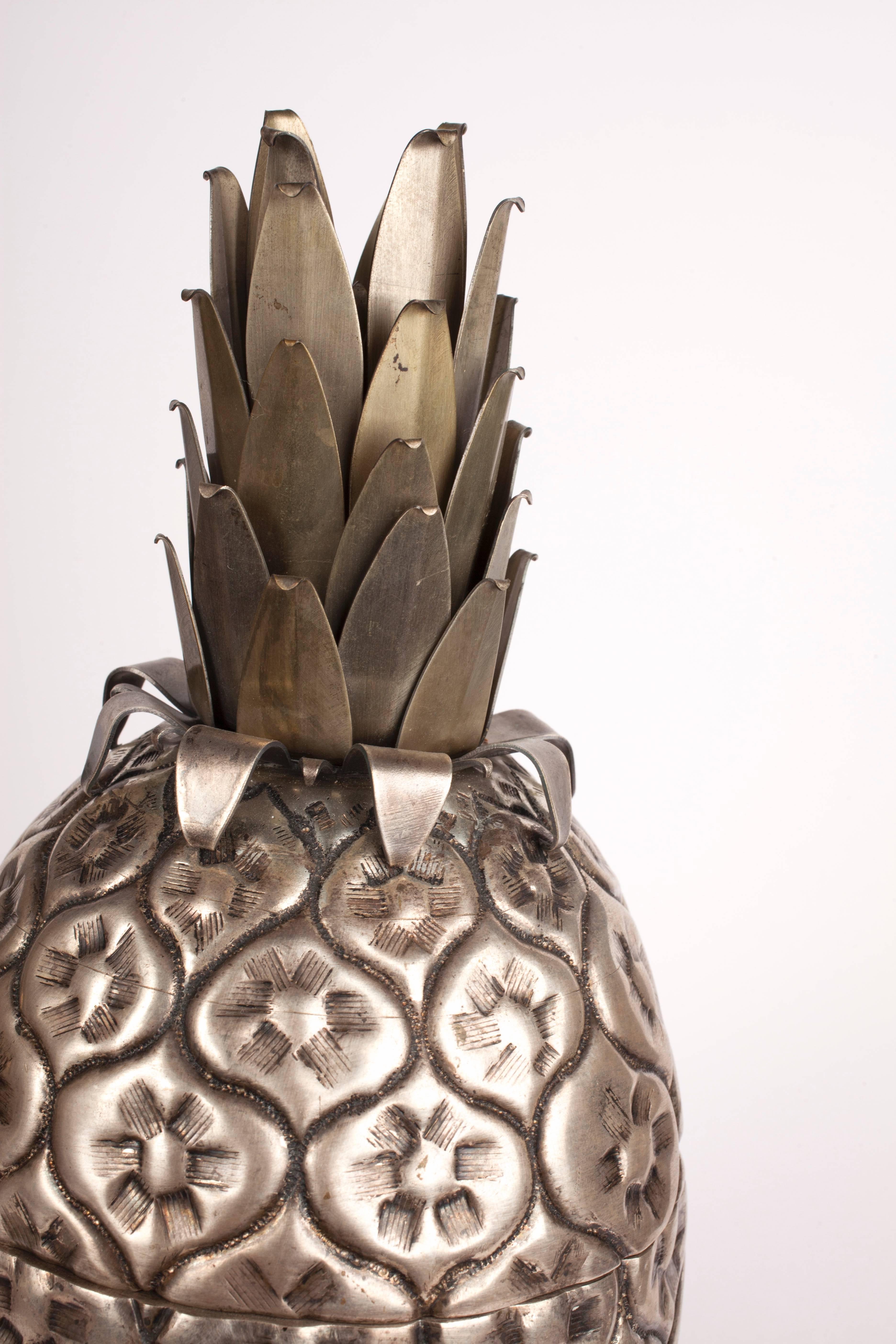 This pineapple ice bucket is what we like to think of as a functional work of art, it sexquisitely beautiful with a wonderfully detailed body and almost brutalist formed fronds. Strongly believed to be Italian and by Mauro Manetti but unsigned.