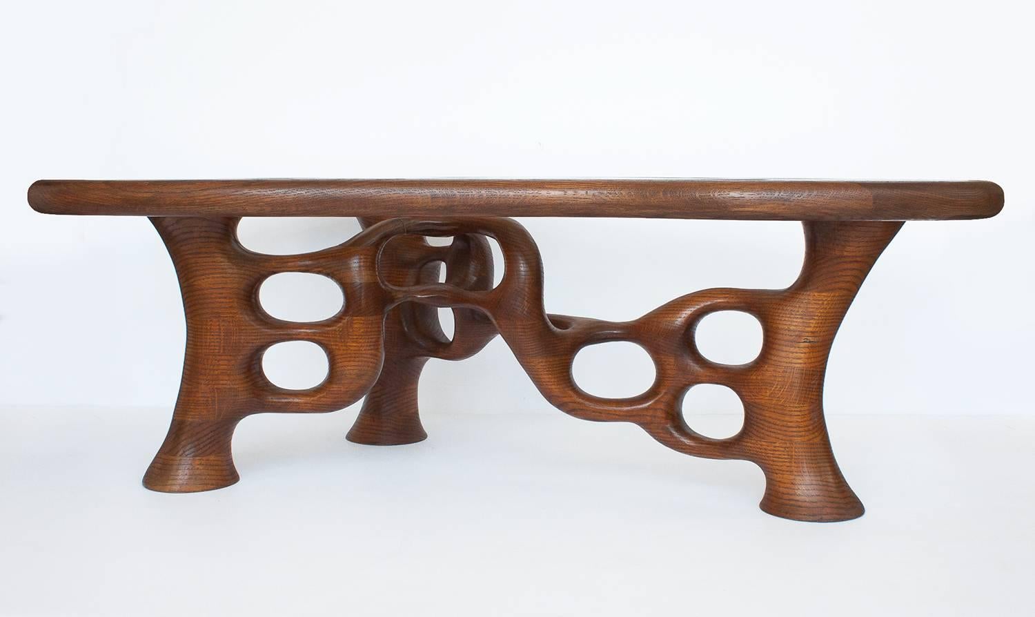 American studio Craft movement free-form coffee table by Craig Lauterbach. For several decades Lauterbach has been making creations, recognizable by their organic curvaceous forms and their fine balance between function and decorative presence. This