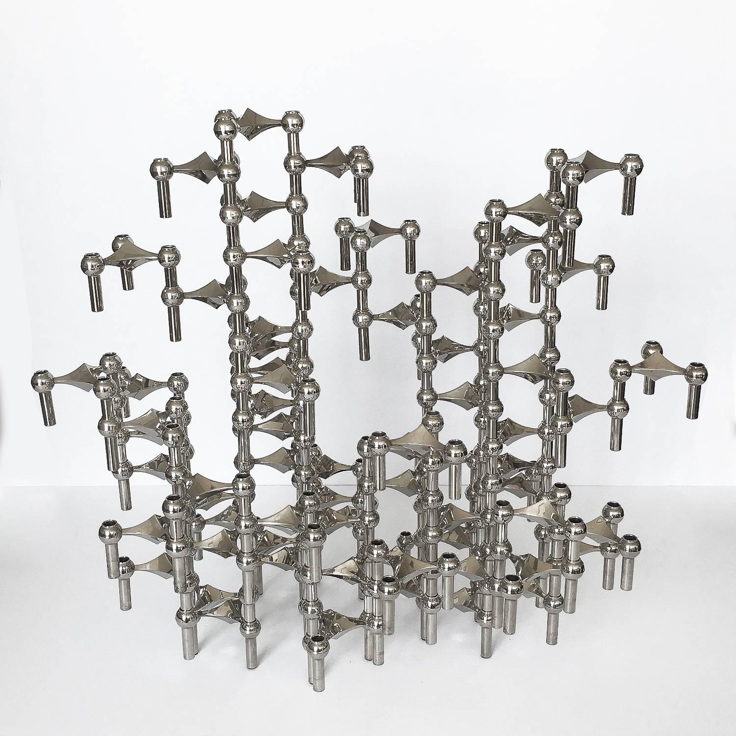 A sculpture made of 58 individual candleholders by Caesar Stoffi and Fritz Nagel for BMF, Germany. This modular design can be configured in an endless number of ways both vertically and horizontally by stacking each interlocking piece. Perfect as a