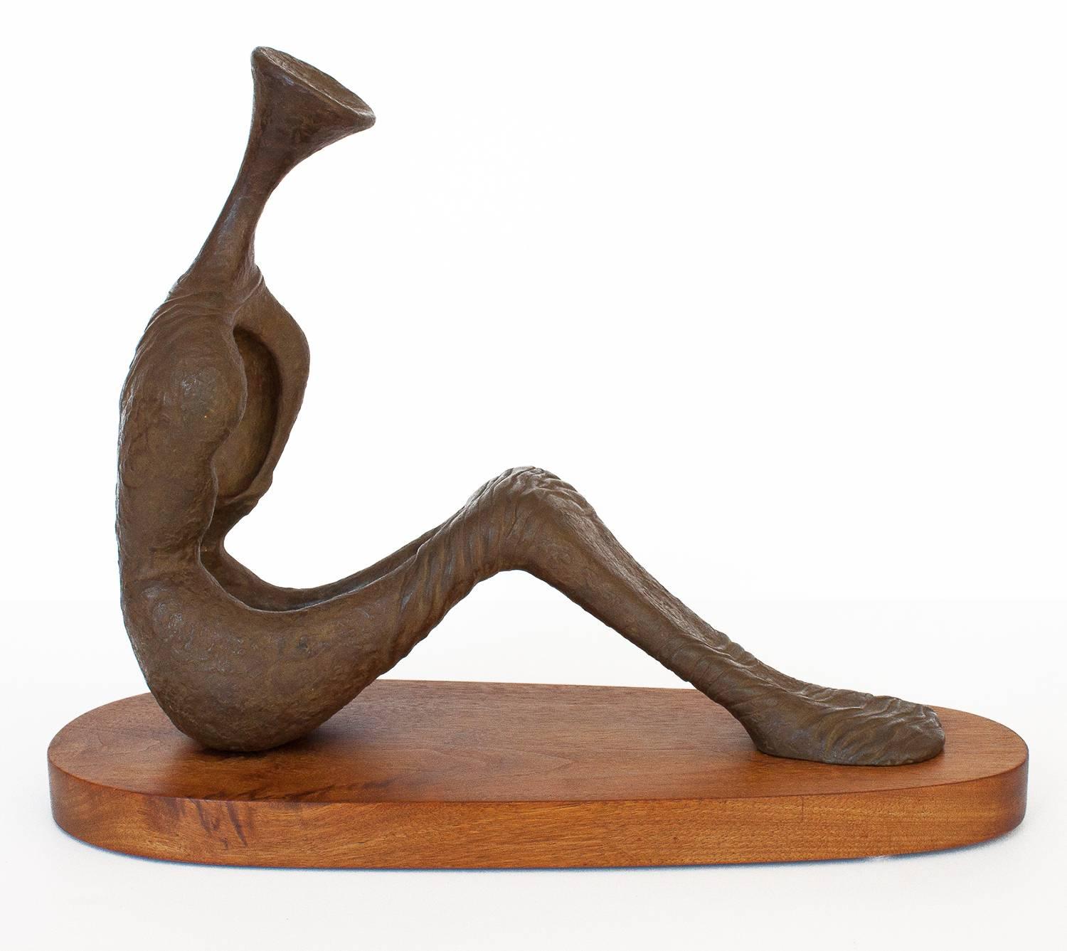Cast bronze sculpture on walnut base by Peoria, IL artist Nita K Sunderland. Titled 