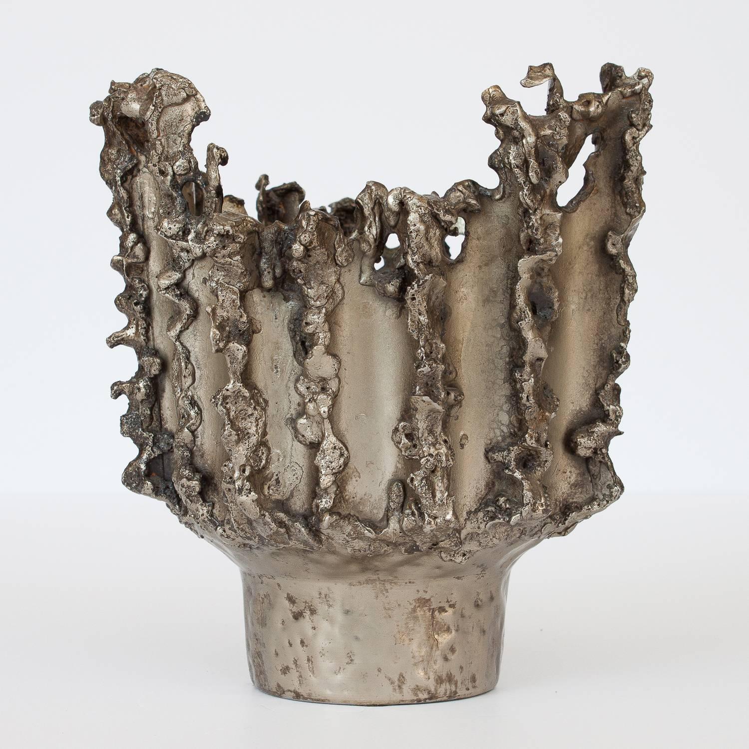 Outstanding Brutalist metal vase by Marcello Fantoni. Torch cut and welded design. Stamped on bottom with 
