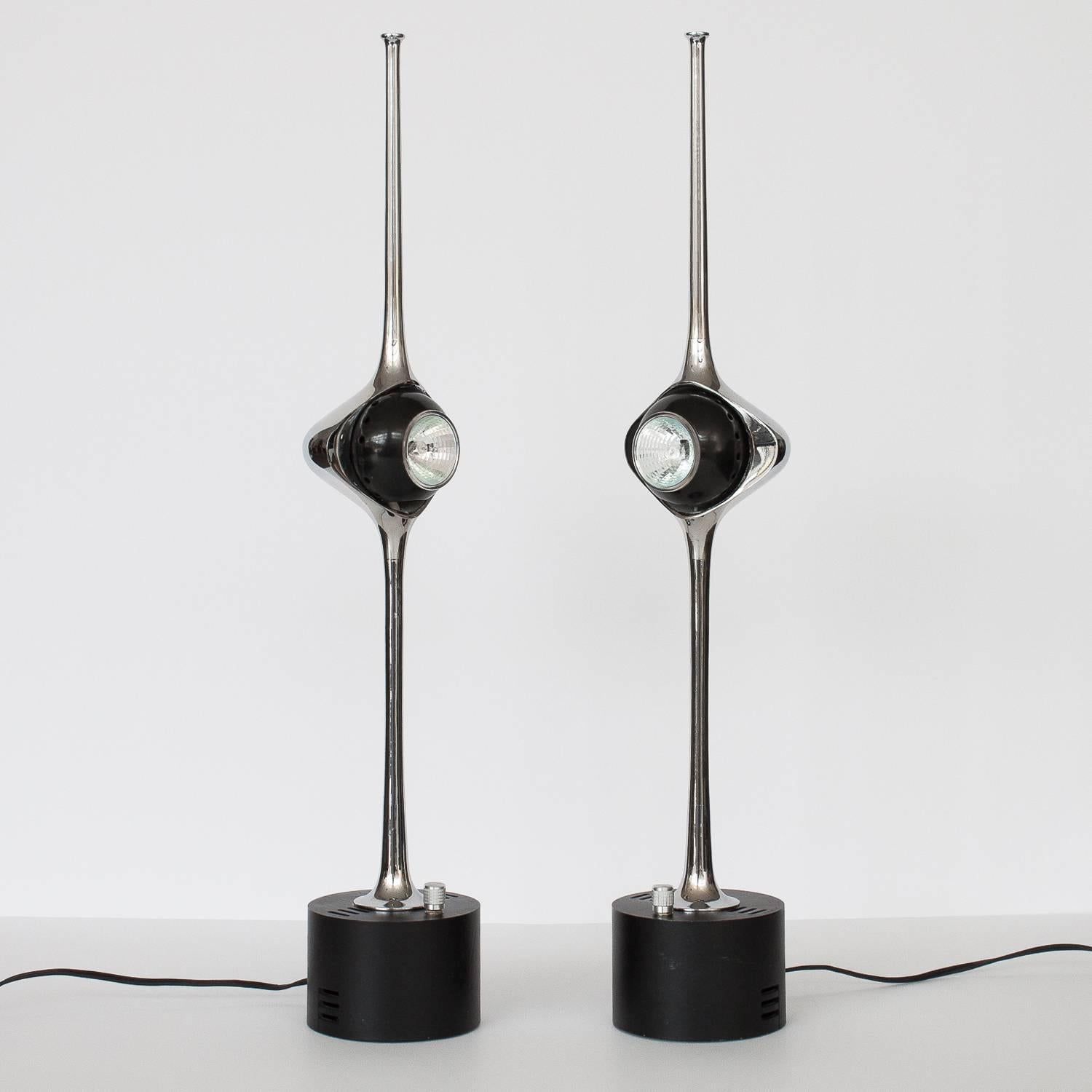 Rare and spectacular pair of Angelo Lelli Cobra lamps for Arredoluce. Chrome-plated brass sculptural form. Metal black enameled cylinder base. Adjustable pivoting magnetic metal shade ball socket. Rotary dimmable on/off switch on base. Working