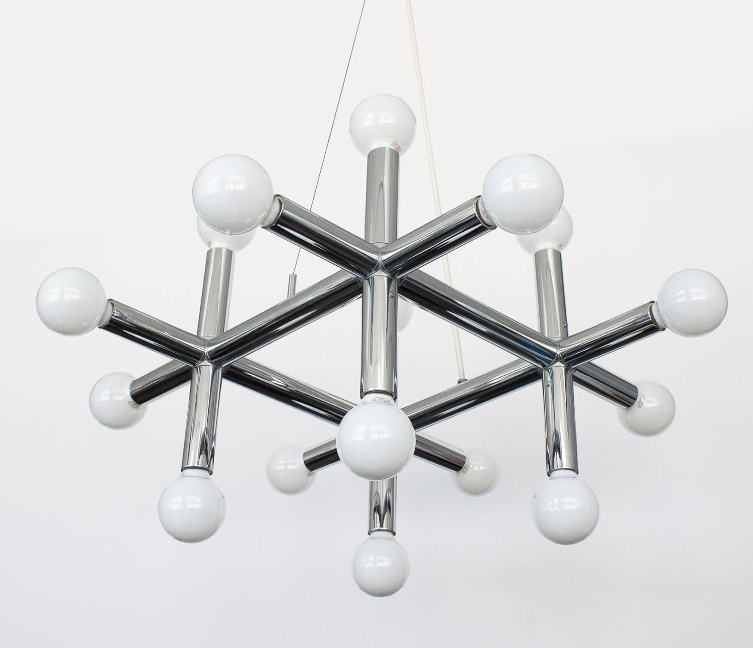 Lightolier chrome geometric chandelier. Grid form hashtag. Chrome-plated steel tubes create a hashtag formation with a bulb at each end. Takes 16 standard light bulbs. Round chrome canopy included. Suspended by white chord and steel wire.
