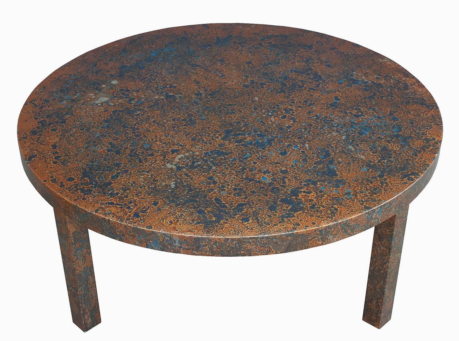 Uncommon Parsons style round coffee table with a very unique lacquer finish of metallic gold, copper and cobalt blue spots. Four 2