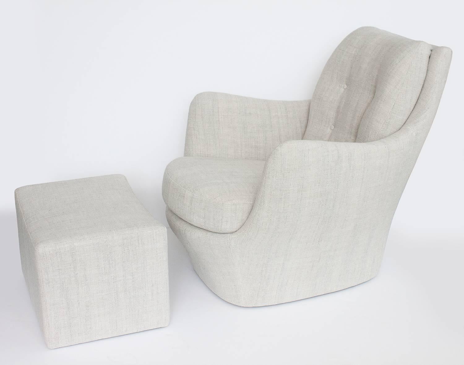 A sophisticated and sculptural lounge chair / ottoman by Milo Baughman for Thayer Coggin. Curvaceous fully upholstered armchair with loose seat cushion and button tufted semi attached back. Ottoman has hidden caster wheels. Newly upholstered in a