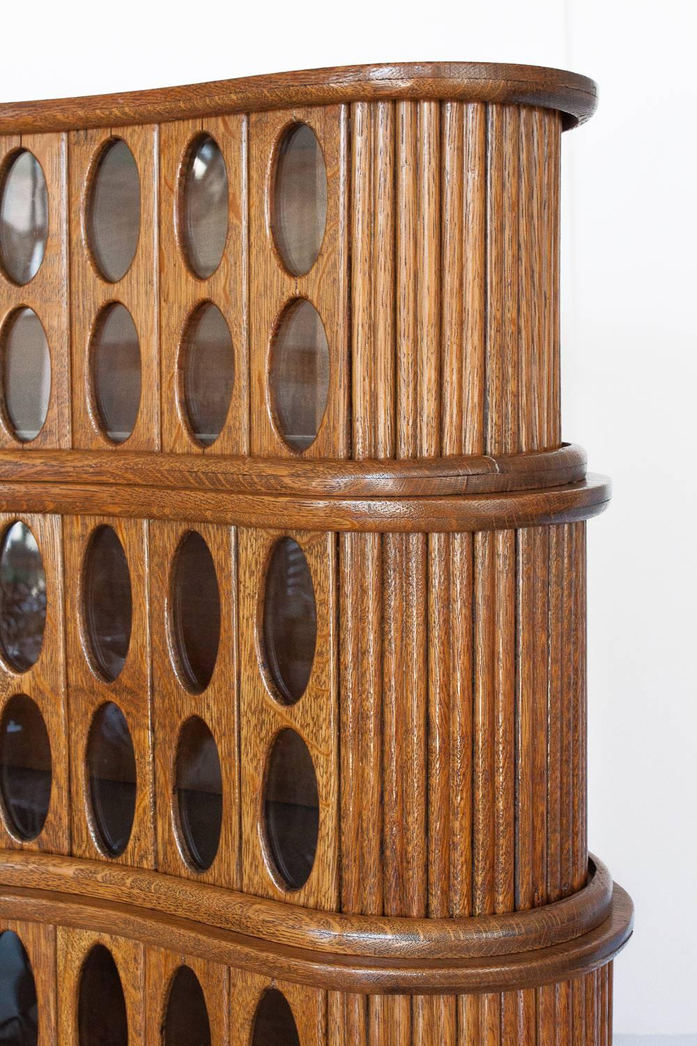 Unique 1930s Sculptural Stacked Oak Tambour Curio Cabinet In Good Condition In Chicago, IL