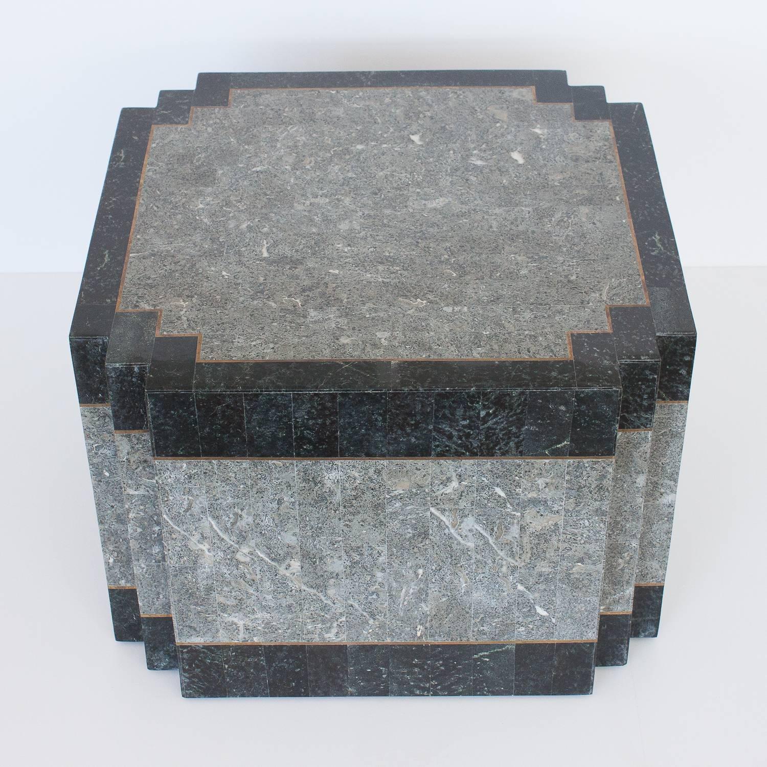 Maitland-Smith tessellated stone table brass inlay. Black and grey stone. This table would work well as a side or end table or small coffee table.