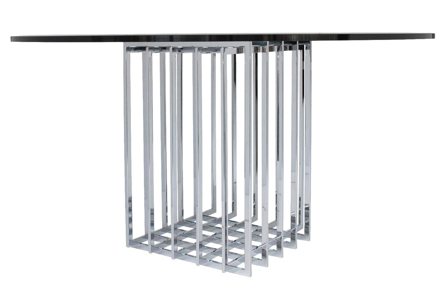 This Pierre Cardin table design features a grid form cage comprised of chrome-plated steel bars. The base is quite heavy. The glass top is 3/4
