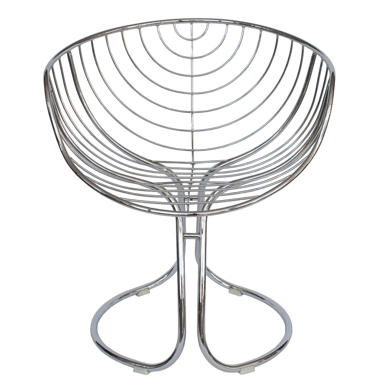 Set of six Pan Am chrome steel dining armchairs designed for the "Pan American World Airways." The wire structure emulates the lines of the "Pan Am" logo. Original white vinyl cushion covers included. Recommended using the
