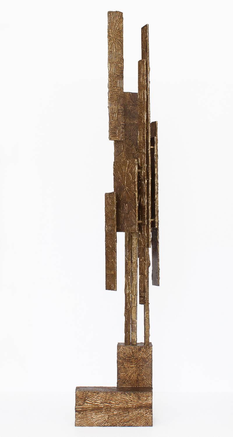 Brutalist bronze resin multi-plane floor lamp in the style of Adrian Pearsall / Paul Evans. Textured resin coated wood panels are assembled asymmetrically to surround a single light source. Starburst textured design. Takes one standard light bulb.