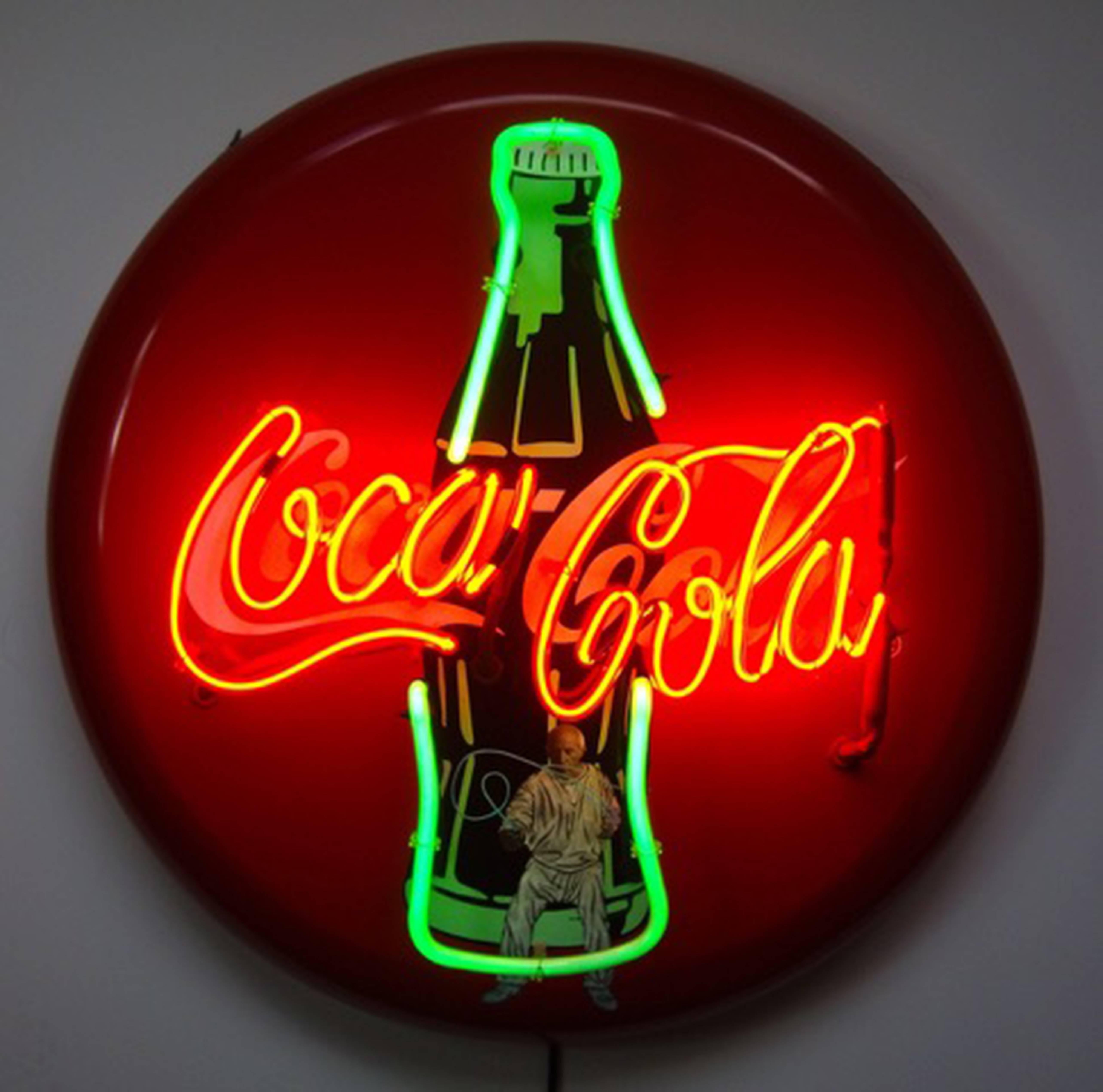 Picasso draws light on coke neon sign, 2015.

Metal sign, acrylic paint and neon, framed.

250v 13A UK power.