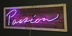 "Passion" in Purple Neon on Dark Wood