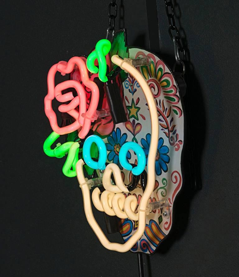 God's Own Junkyard designed Neon Artwork.

Hand-painted Mexican sugar skull with neon outline and rose detail.

Lights of Soho present. God's own junkyard. New and used neon fantasies, salvaged signs, vintage neons, old movie props and retro