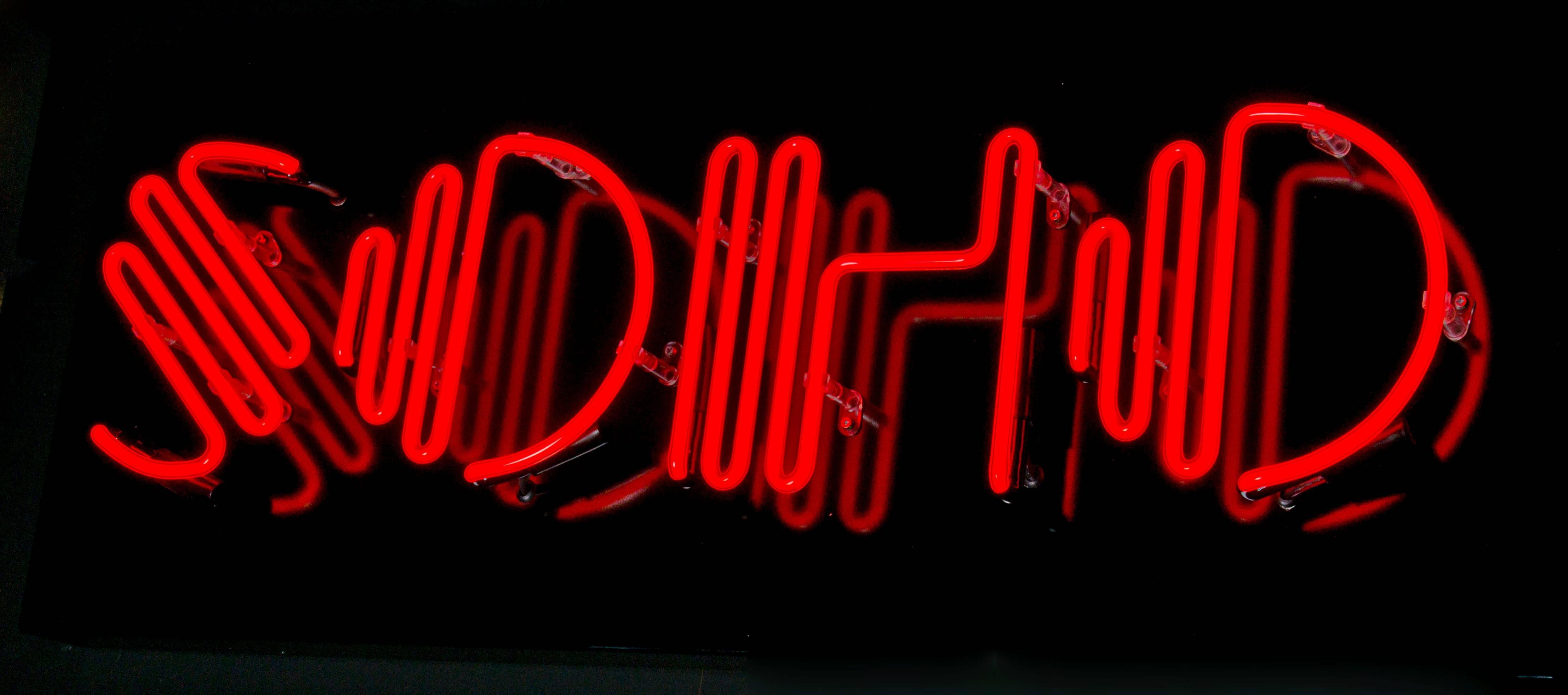 "SOHO" in Ben Eine neon typography.
Ben Eine.
Red/orange neon on black aluminium tray.
100 x 40 x 7 cm.
Edition of 4.
£4500.

Ben Eine in collaboration with lights of Soho & Moniker projects are proud to present the first ever